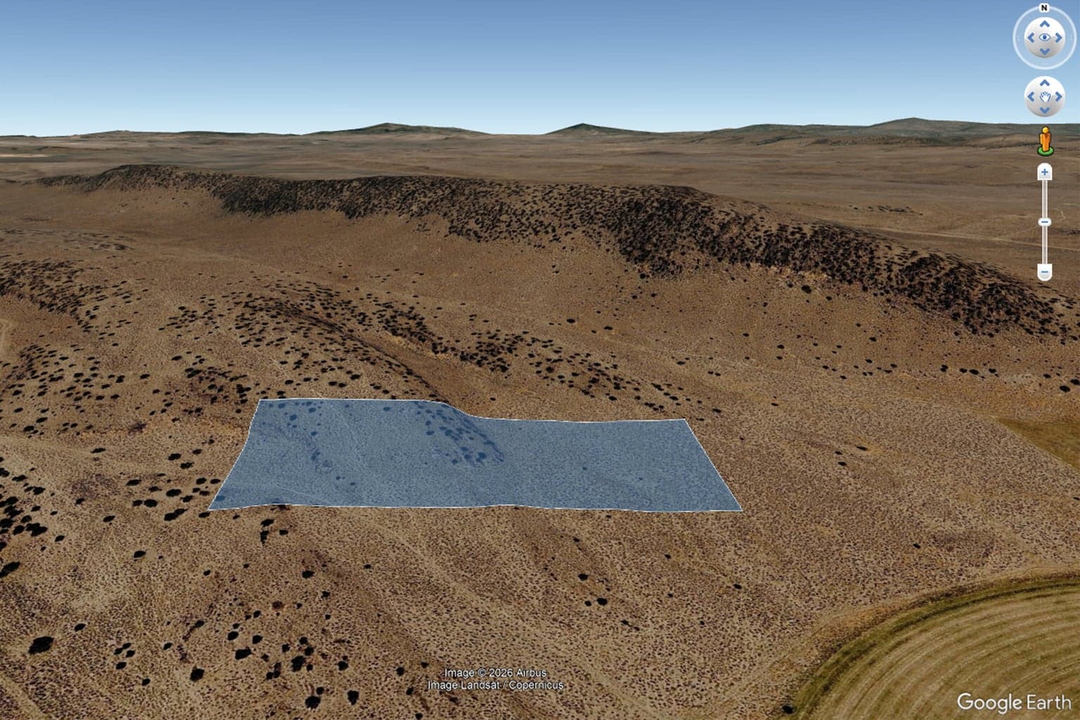 Google Earth aerial looking north.