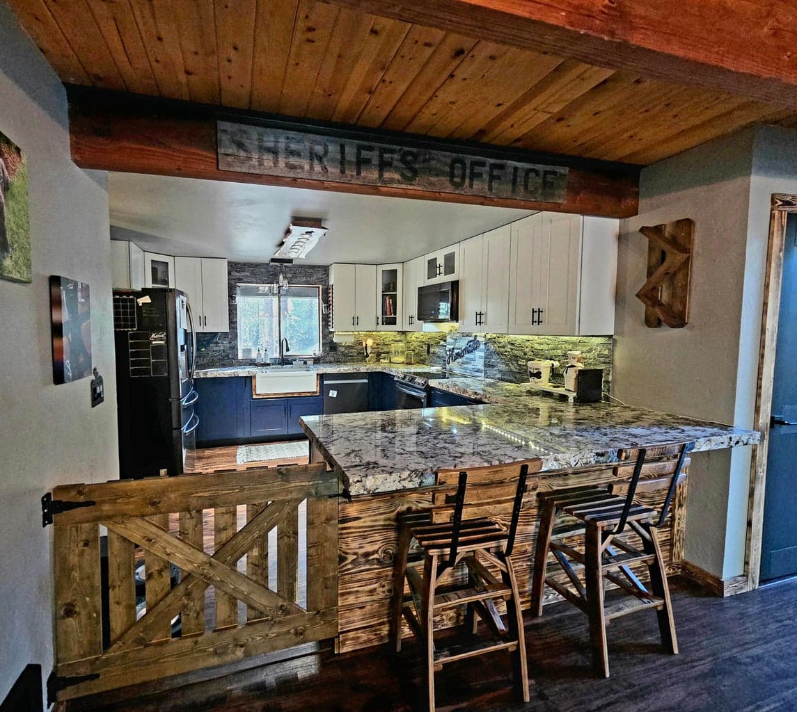 kitchen view (note custom gate is contain children/pets) from kitchen area.