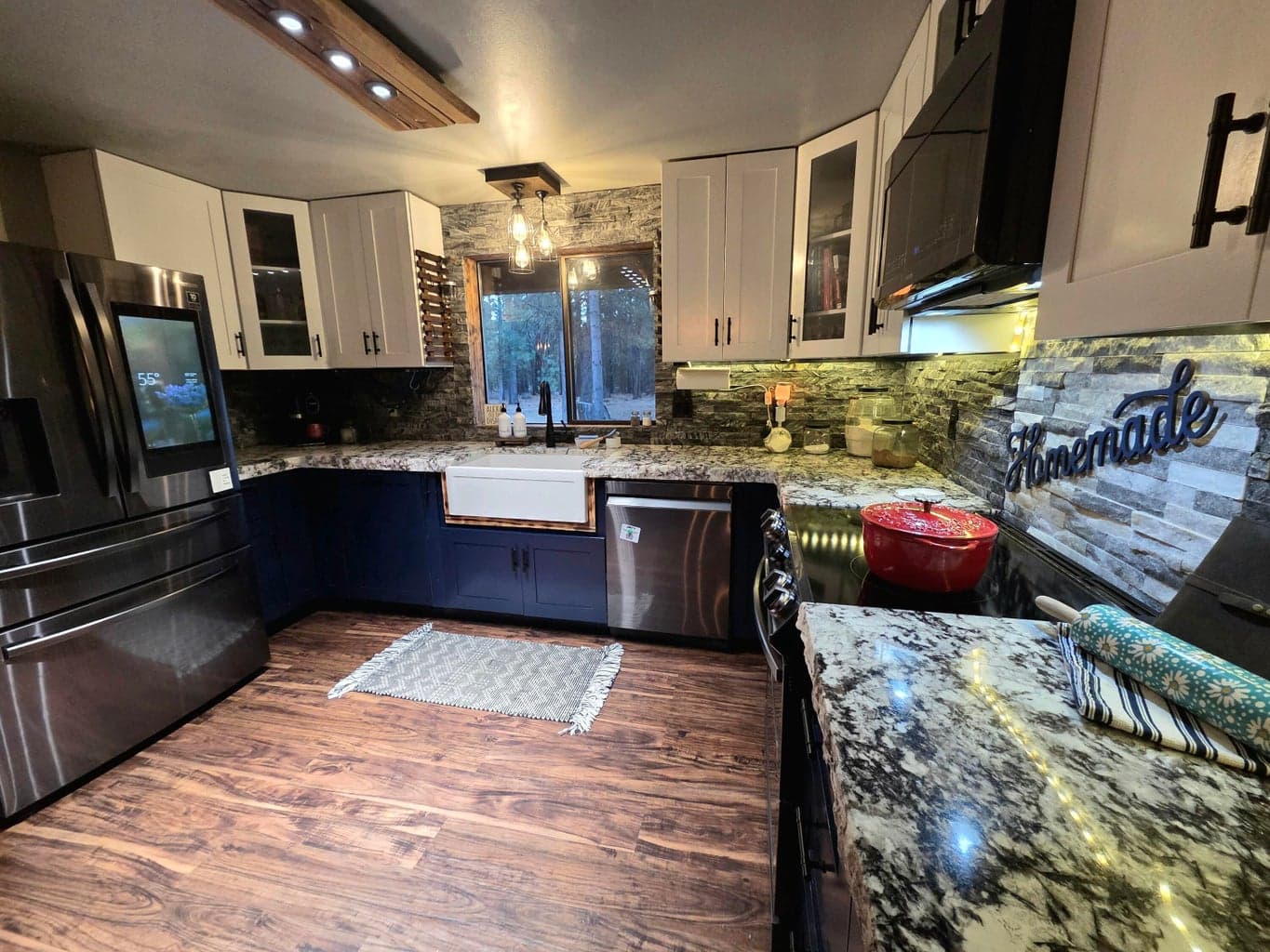 New cabinets accented by the granite countertop
