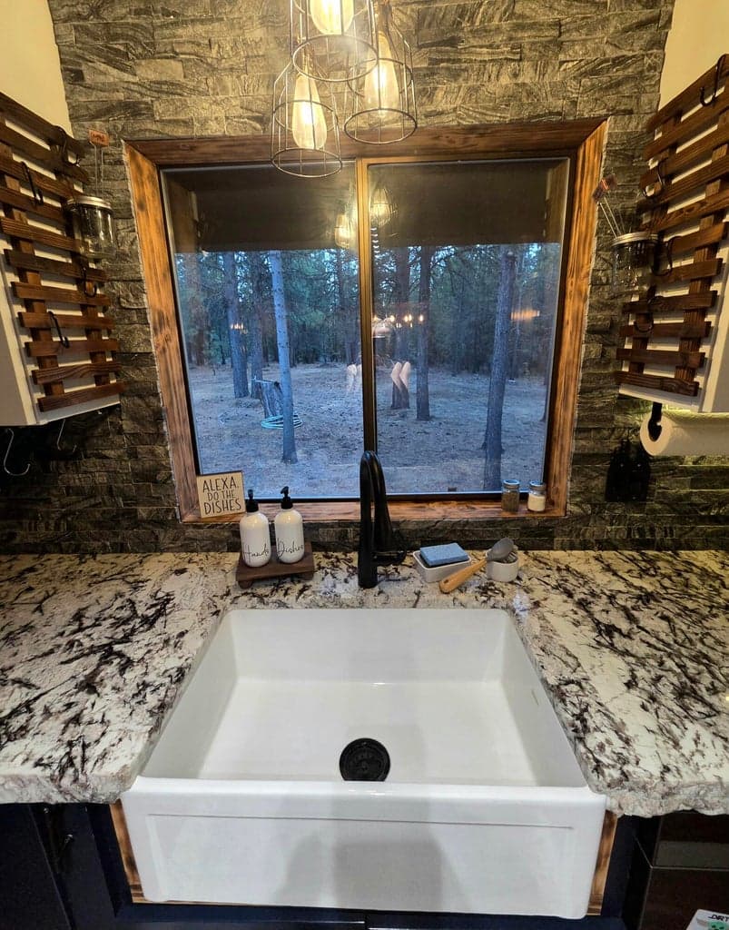 fram sink with handsfree water featured in the faucet.