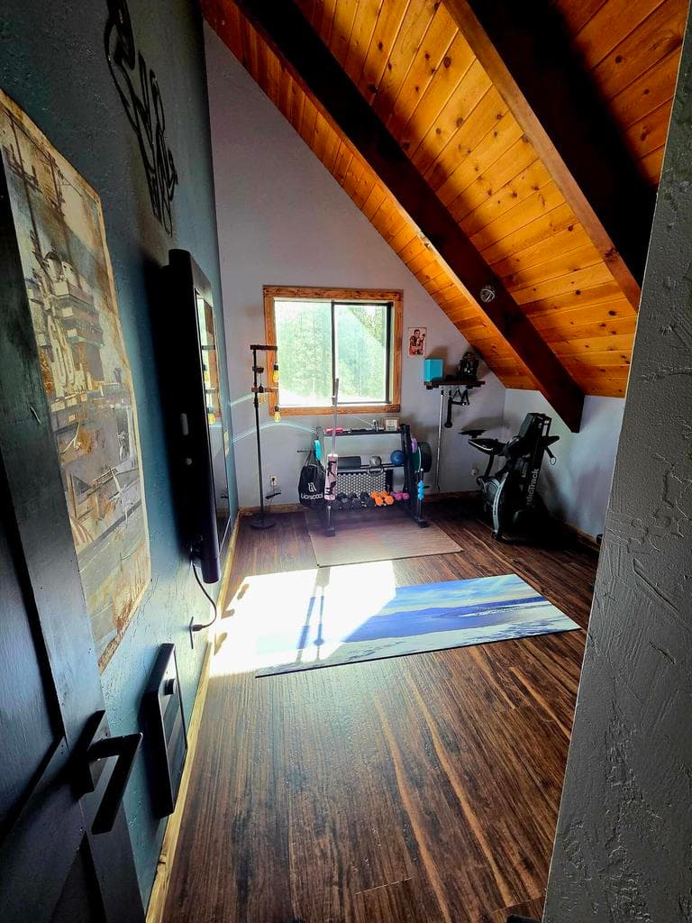 Bedroom #2 upstair, currently used as a workout room.