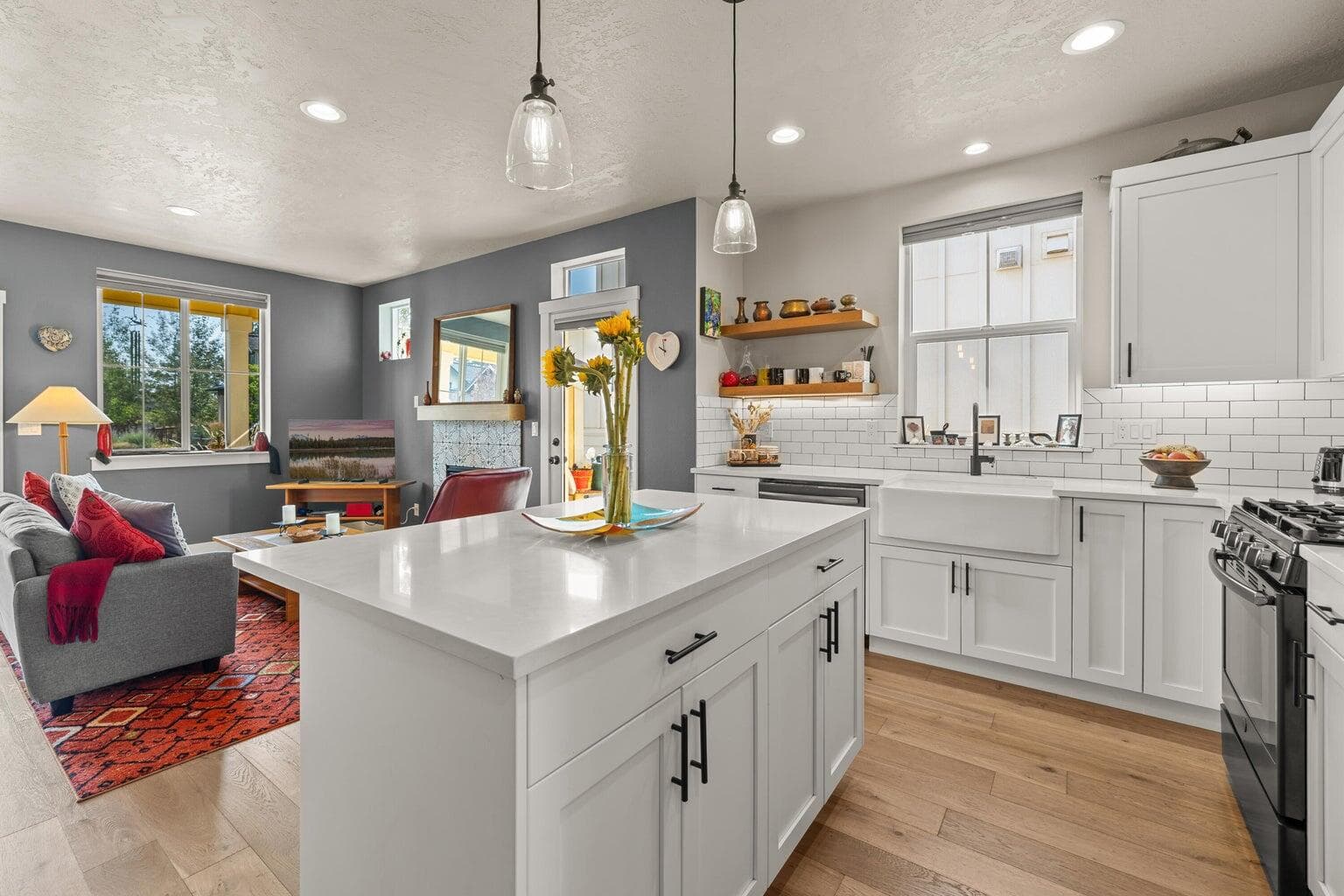 Kitchen with quartz counters and breakfast bar