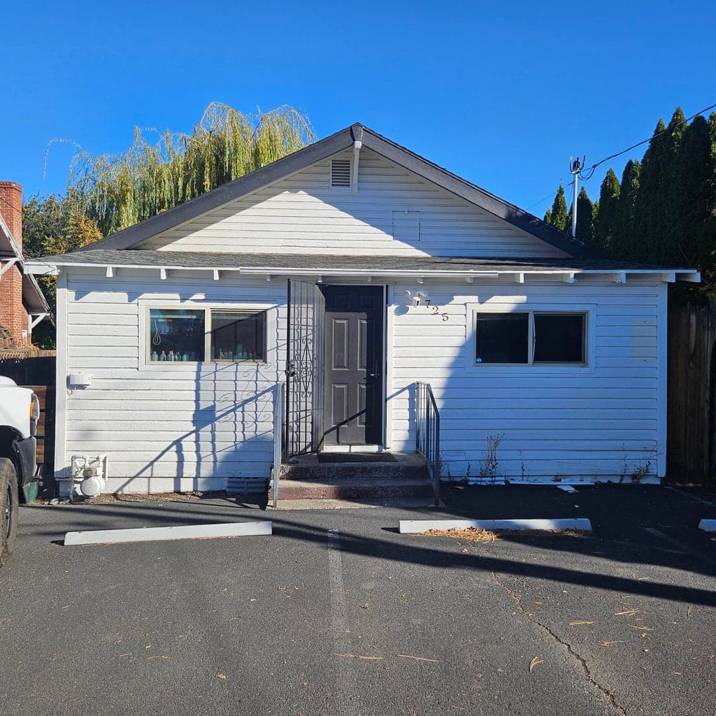 Alley access parking provides 4 off street spaces, on of which is ADA compliant.