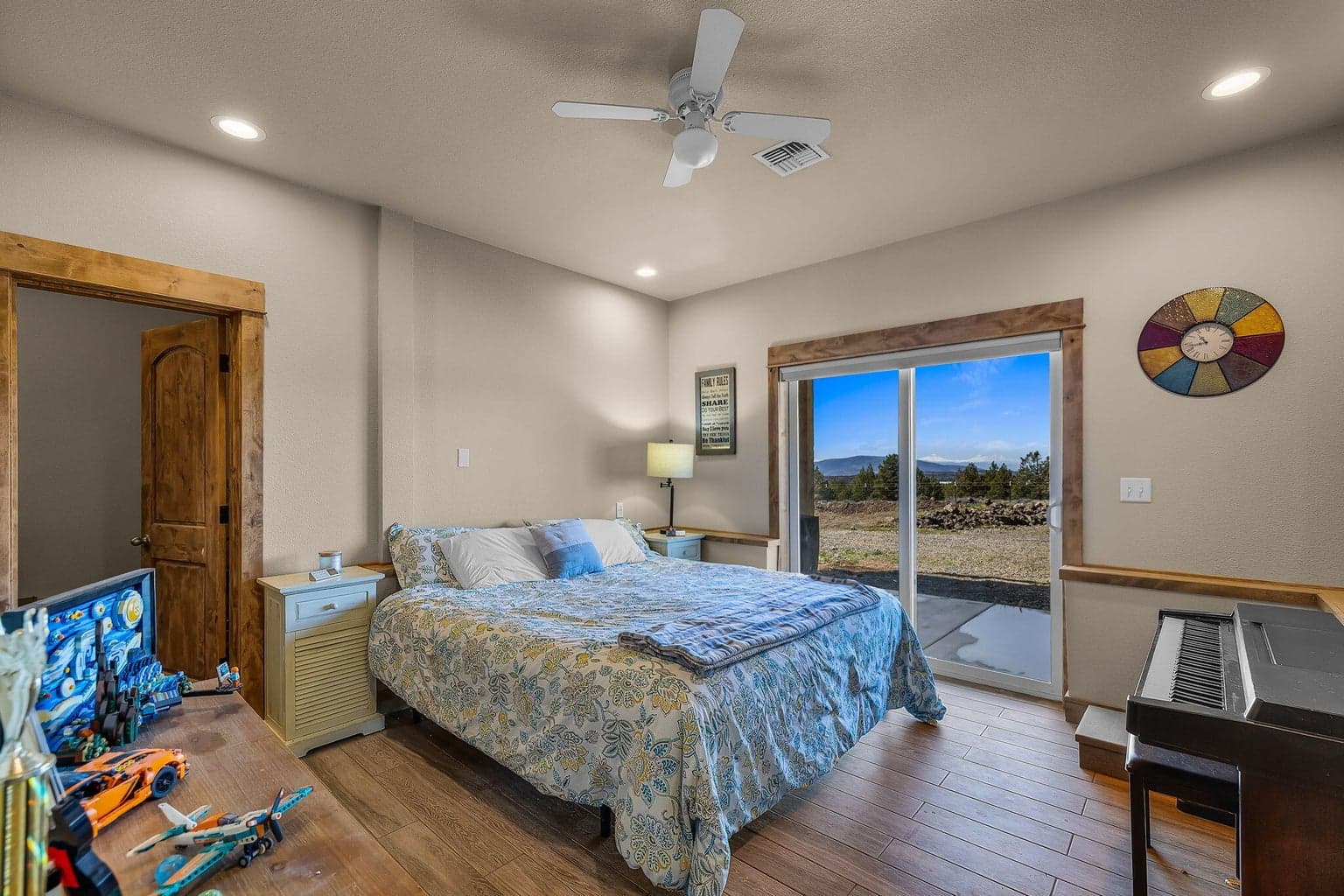 One of two bedrooms on lower level ... mountain views and easy access to outdoors.