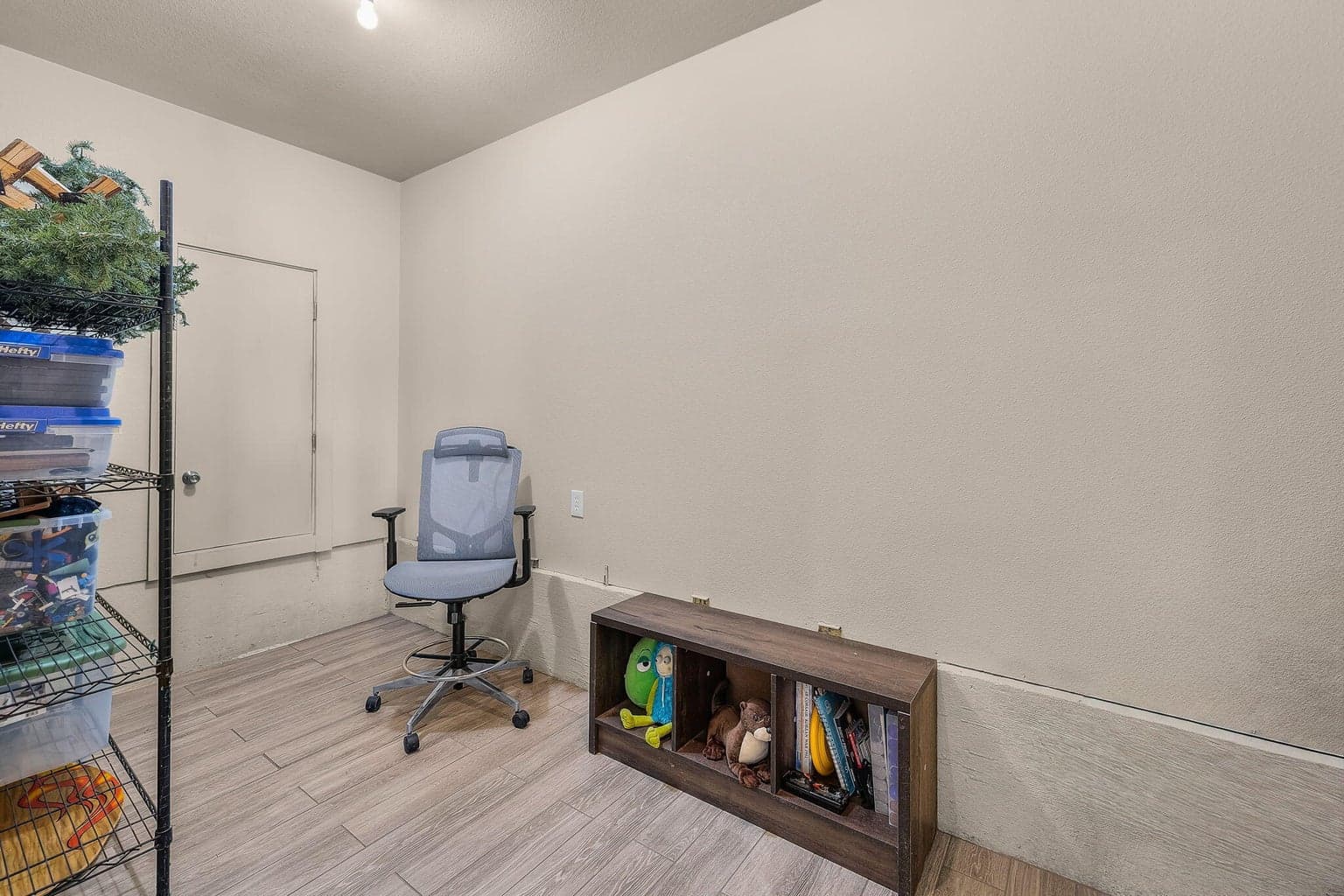 Storage room in lower level with access to under home walkable storage