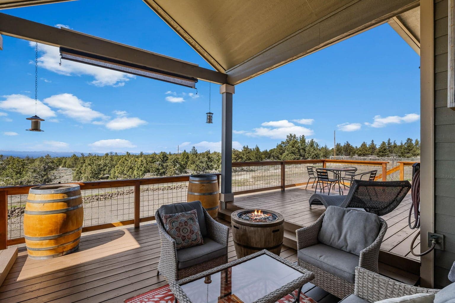 Upper deck patio off the Living room ... a relaxing space to enjoy the outdoors