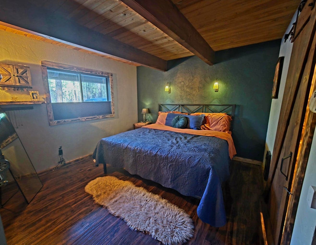 Master Bedroom off of dining area..