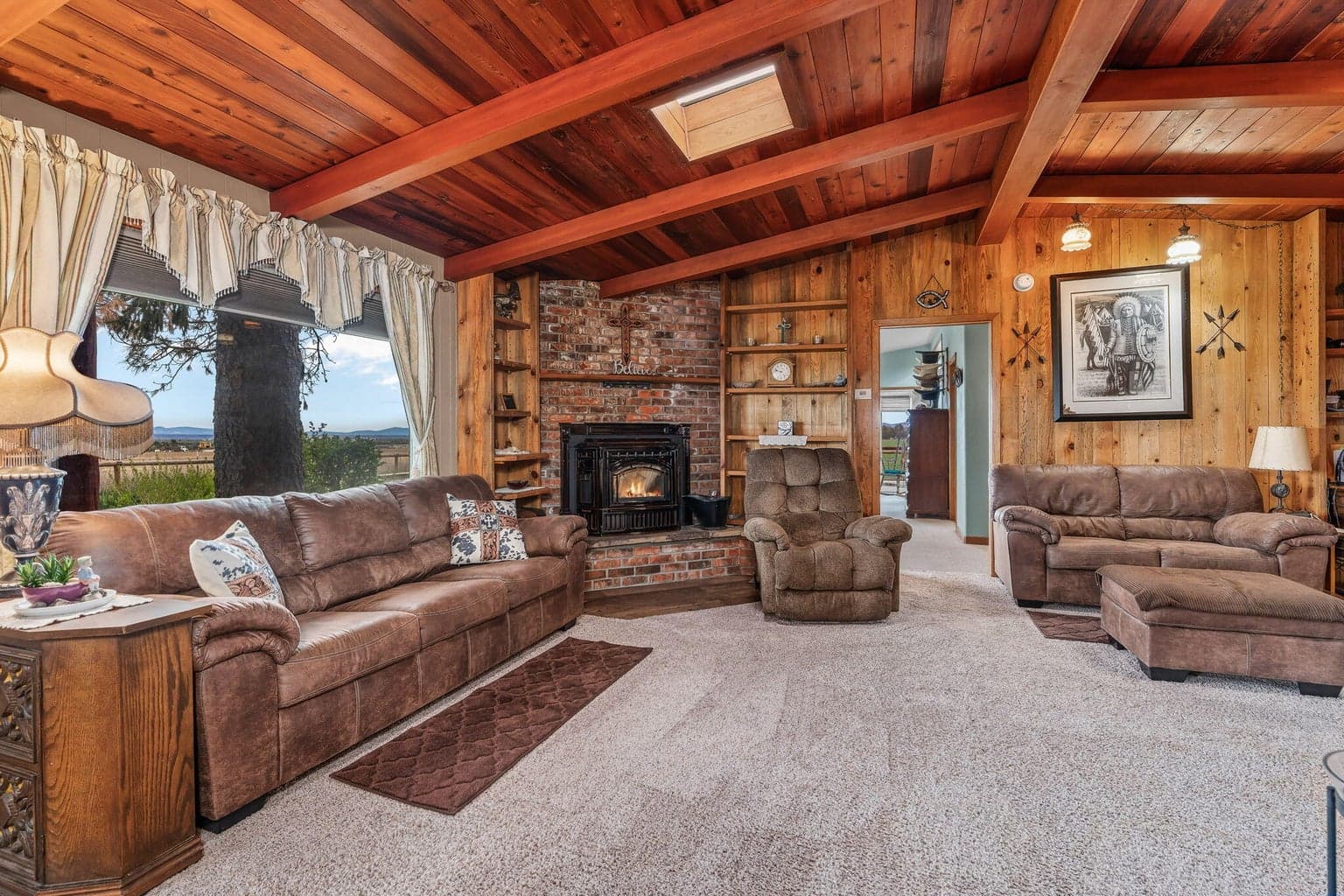 Open living area with natural light and simple finishes.