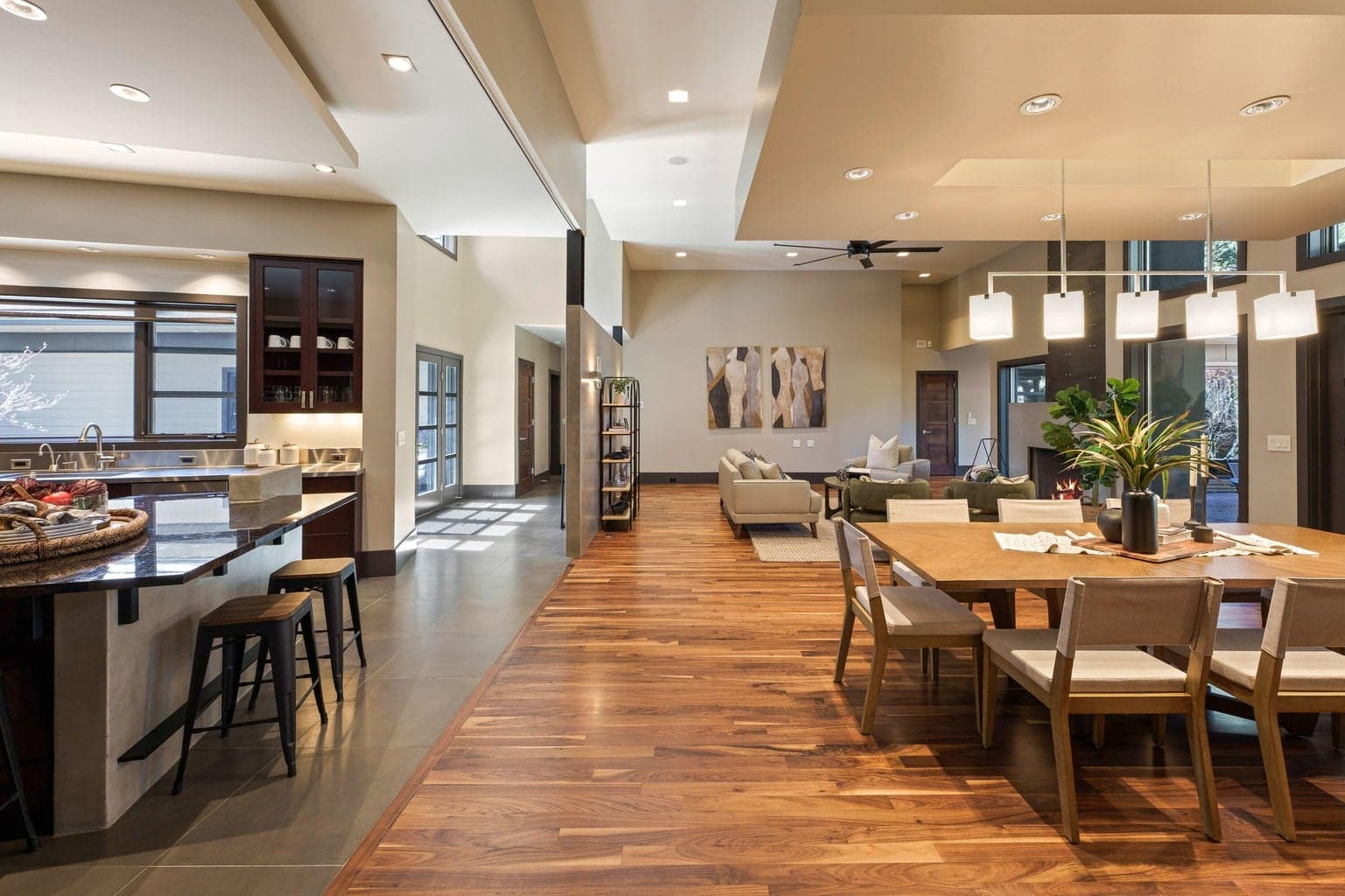 Open-concept living with vaulted ceilings and seamless flow—bringing together kitchen, dining, and living in one cohesive space.