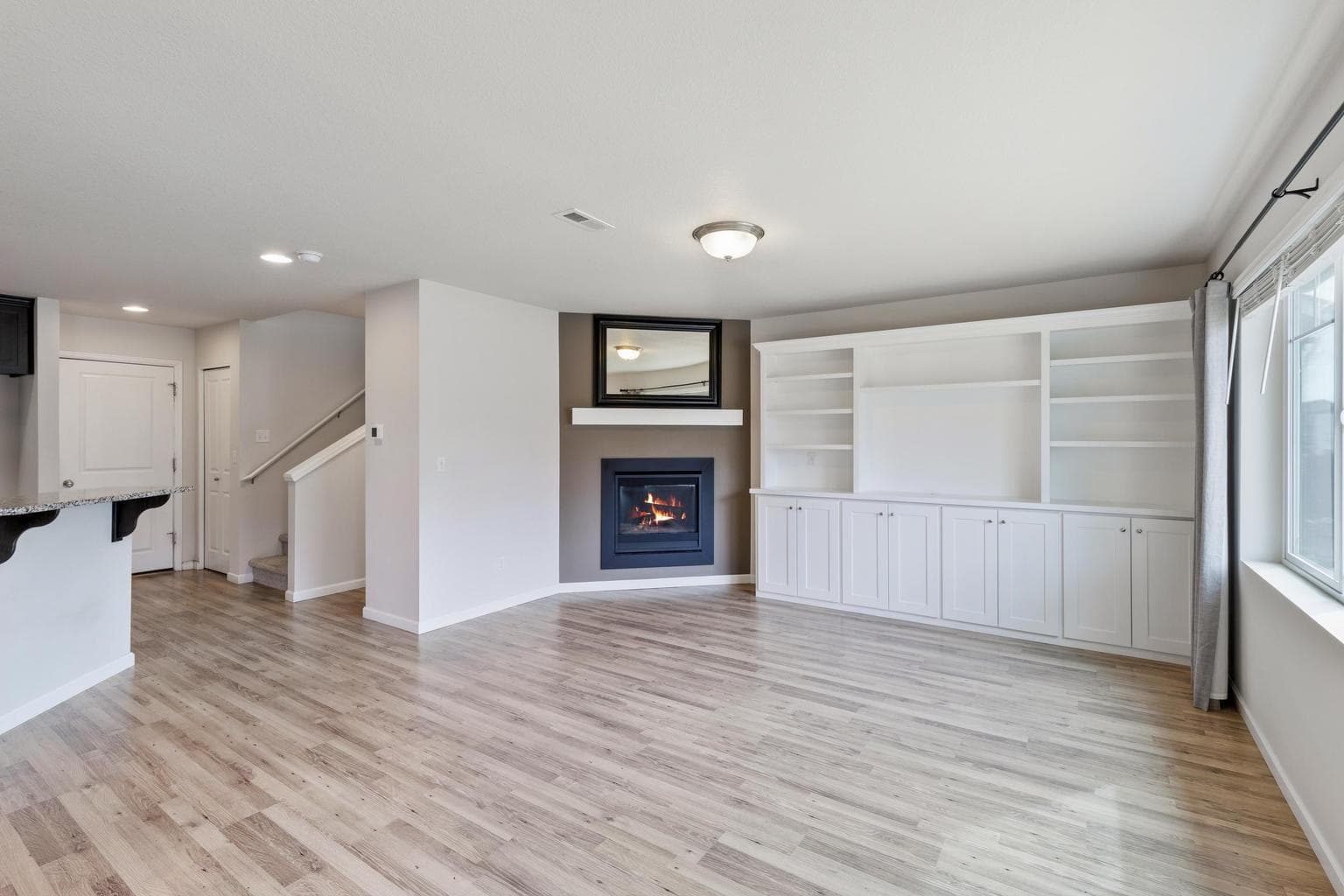 gas fireplace and built-in cabintry