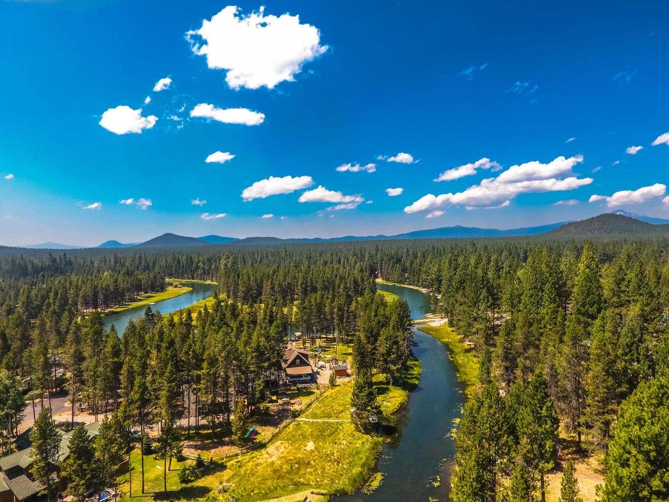 Live. play, and dream on a riverfront property.