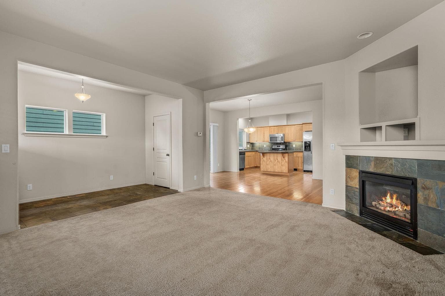 Close-up of the fireplace area and built-ins in the great room.