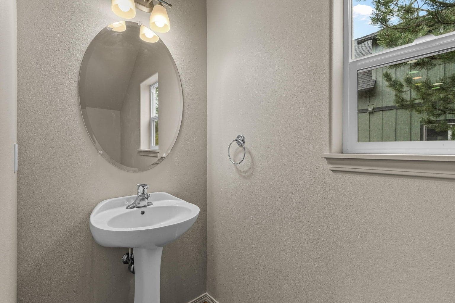 Convenient main floor powder room/half-bath.