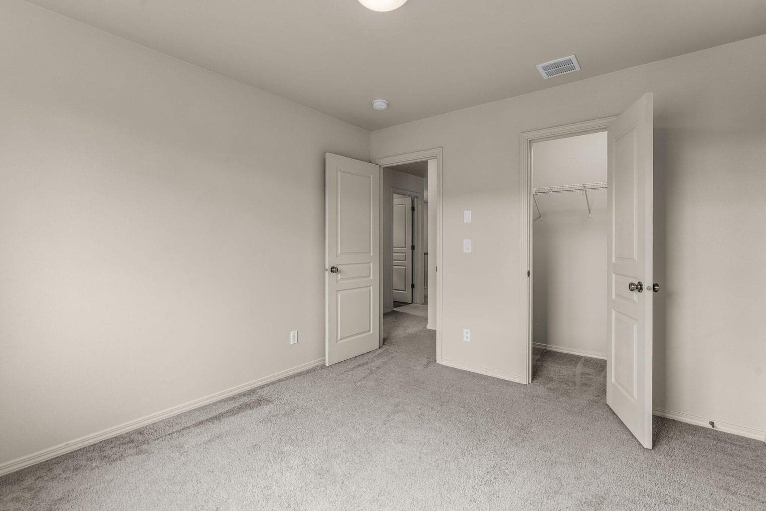 The second bedroom, well-sized with a standard closet.