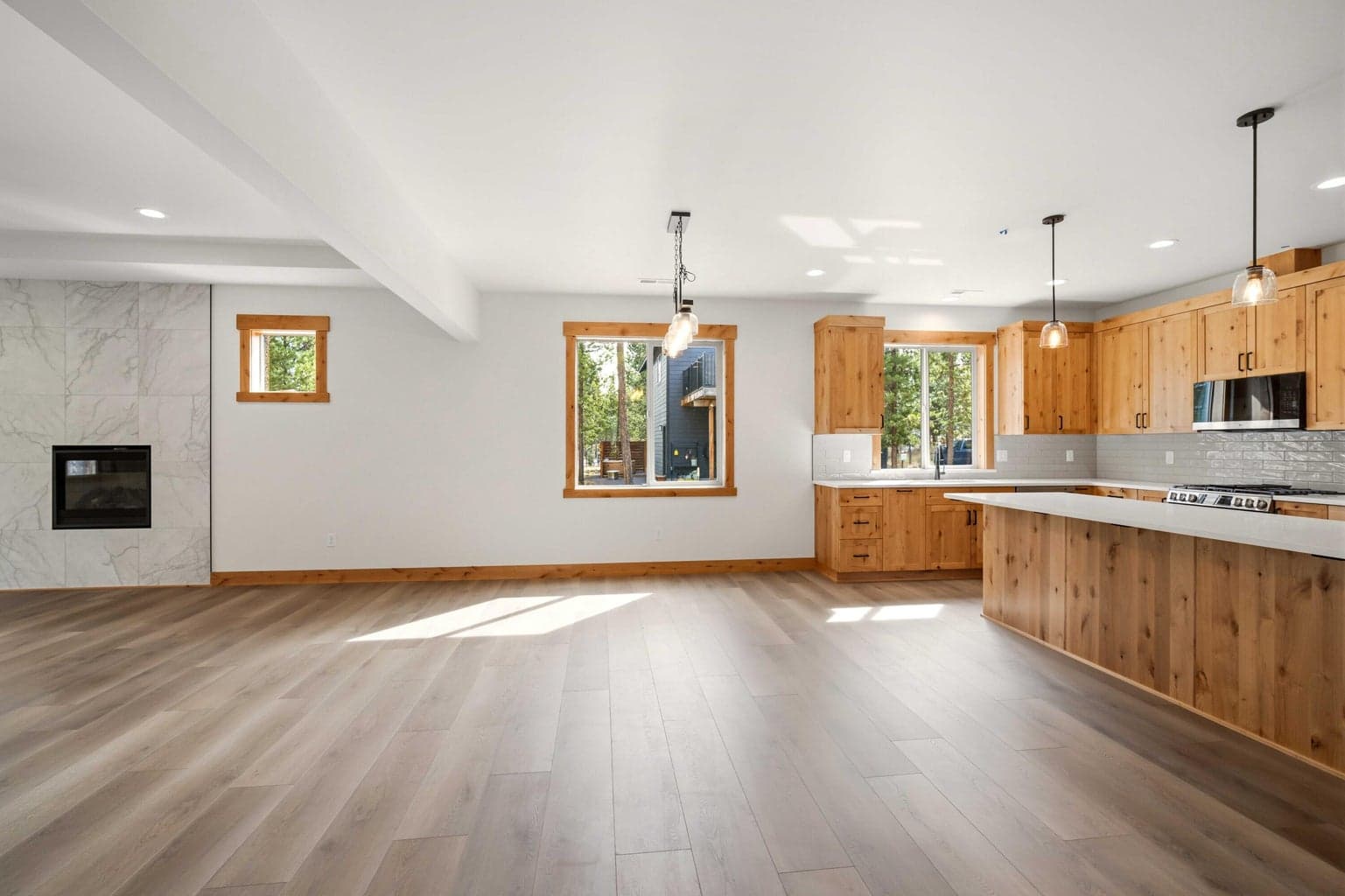 Open dining area and kitchen provide a comfortable, flexible space for casual meals, hosting, and daily life.