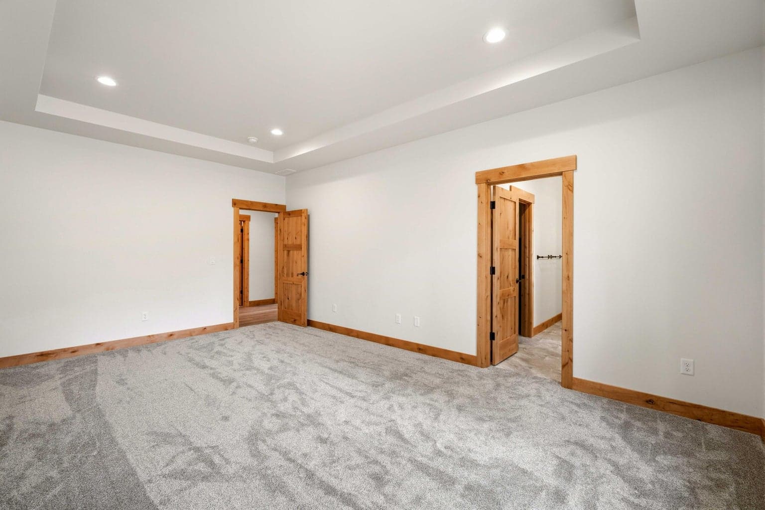 Large primary suite with easy access to the en suite bath, creating a comfortable and private retreat within the home.