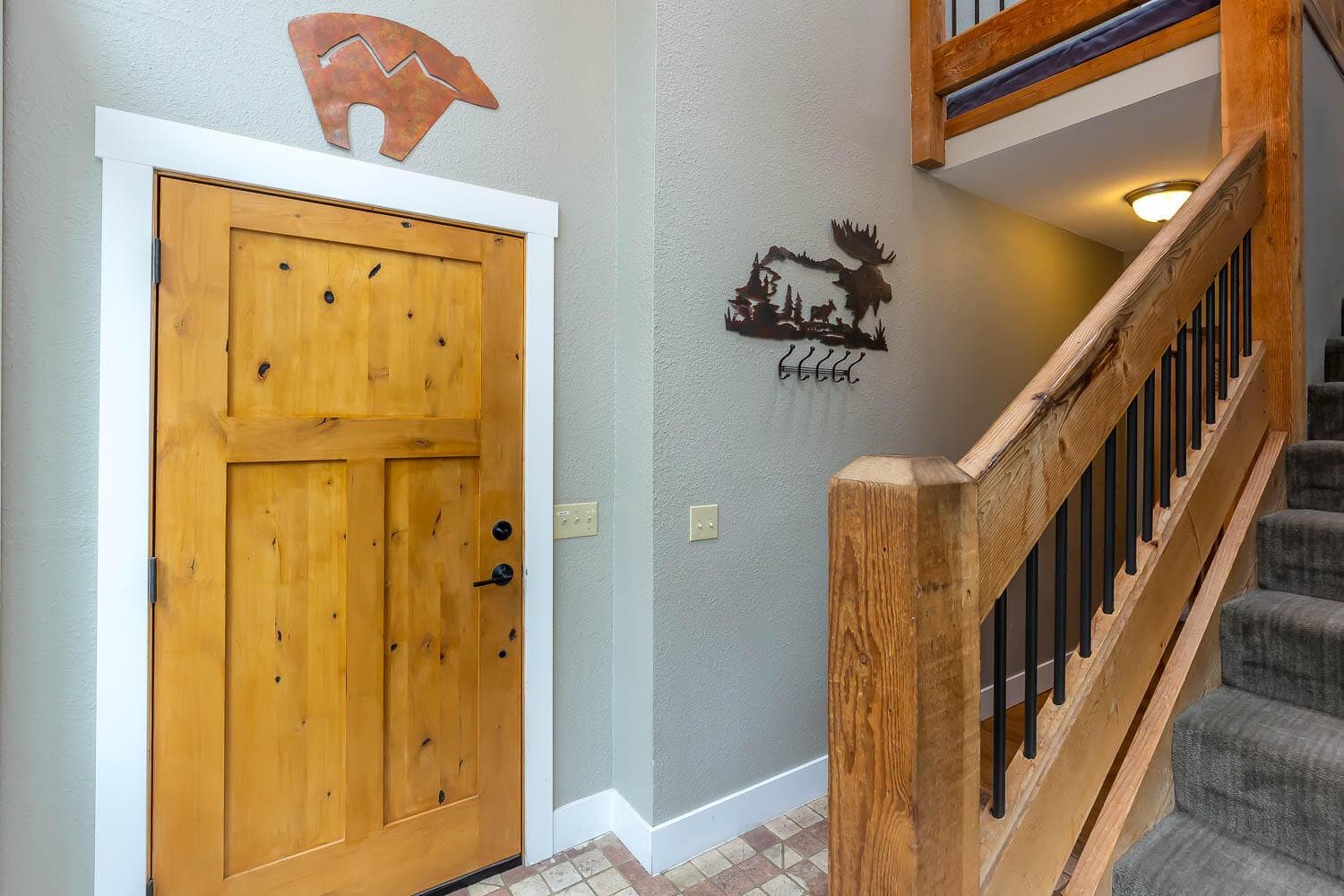 Great room, primary bedroom, bathroom and loft up; two guest rooms, bathroom & laundry on entry level