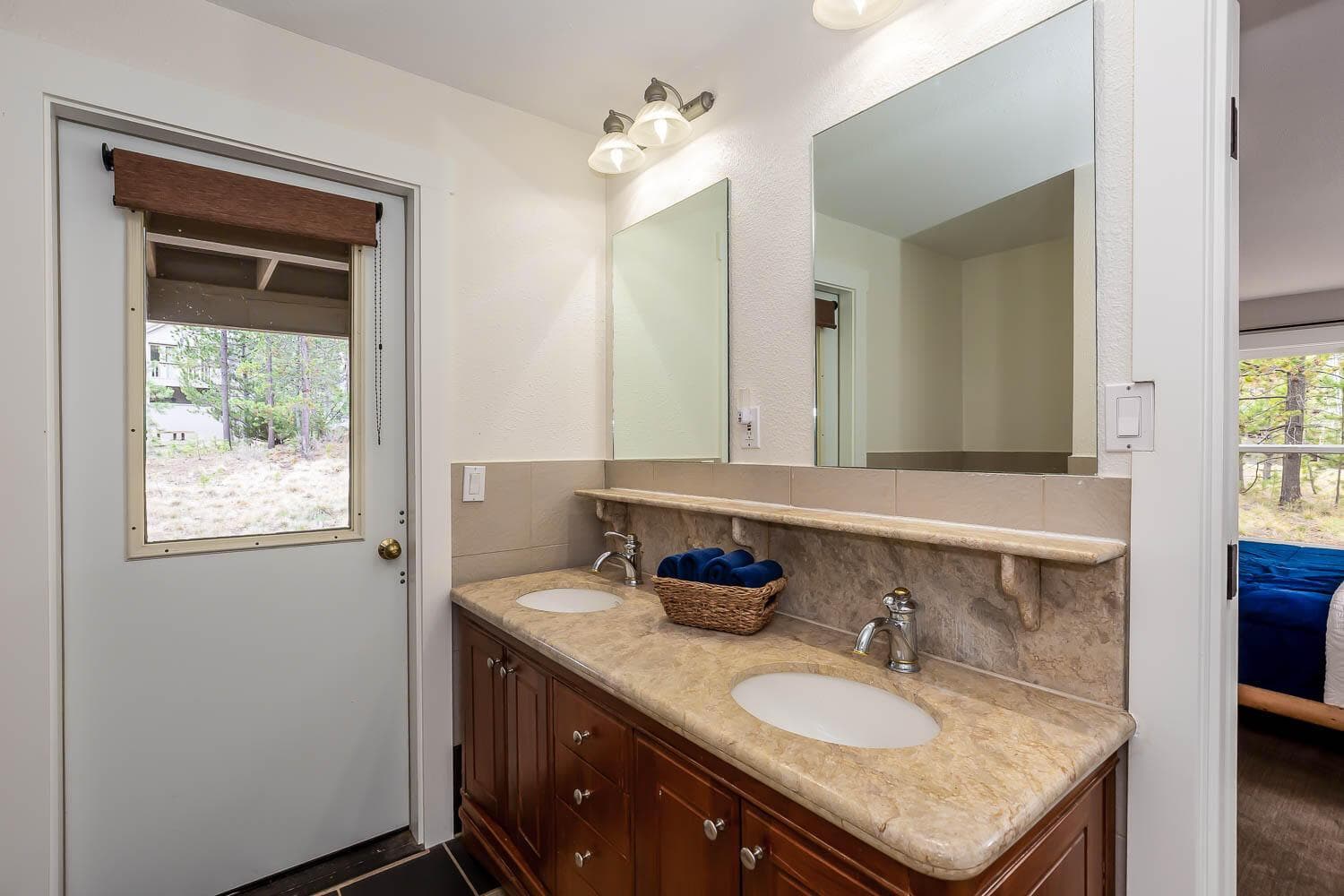 Tub/shower combo, accessible via the hallway or 2nd guest room, and opens to the lower patio/hot tub area