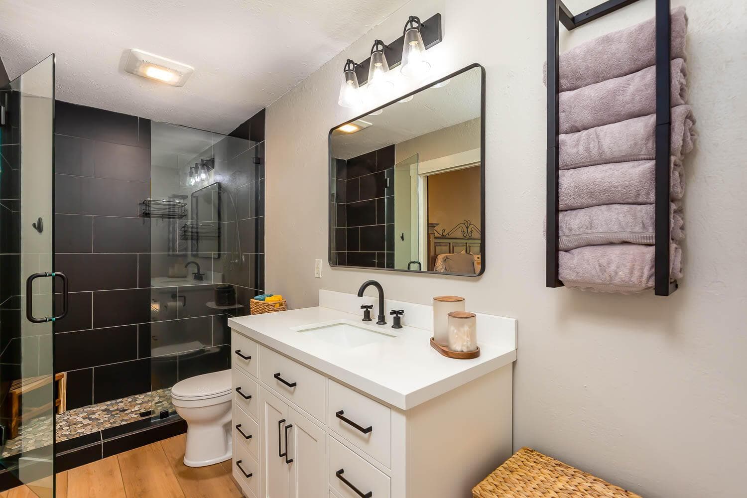 Main floor bath can be accessed from the primary bedroom or the great room