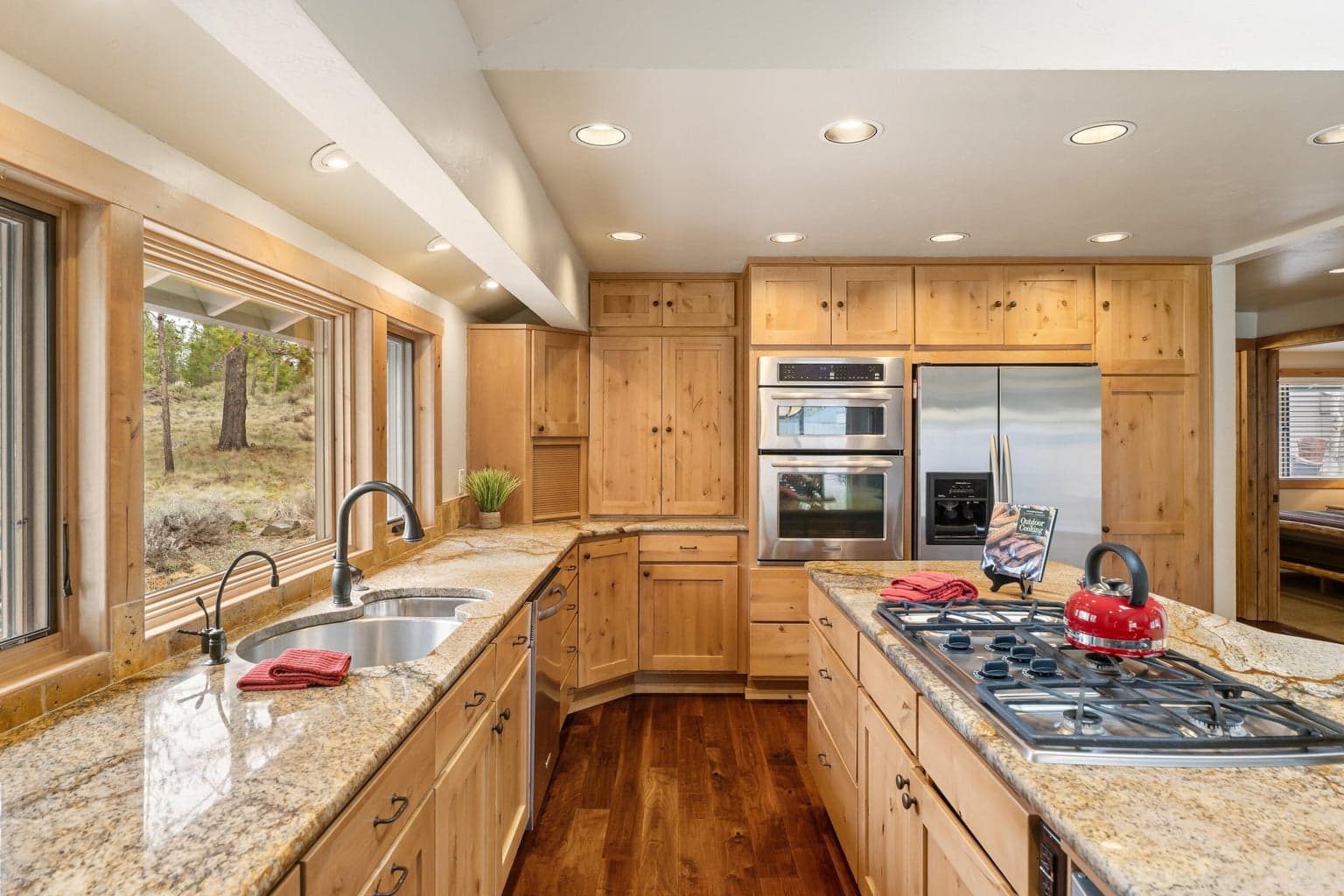 Well appointed kitchen with stainless steal appliances and granite countertops