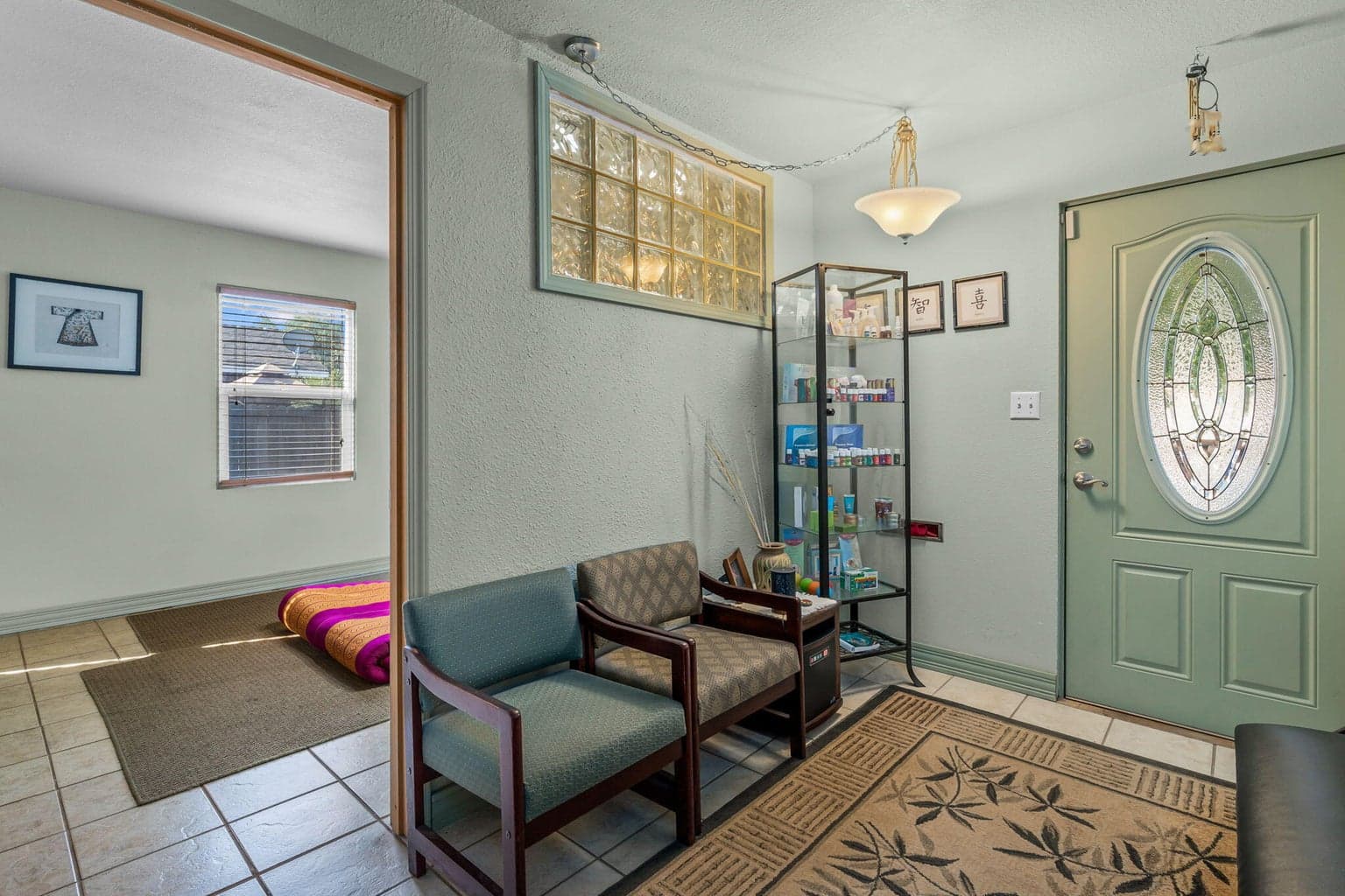 Notice how bright the "living room" or office is behind the wall!