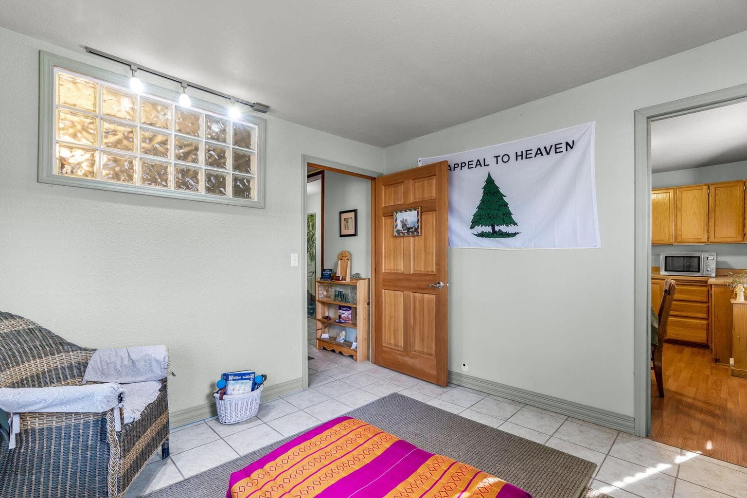 Living Room. Wall into kitchen could also be removed to make this into an open great room.