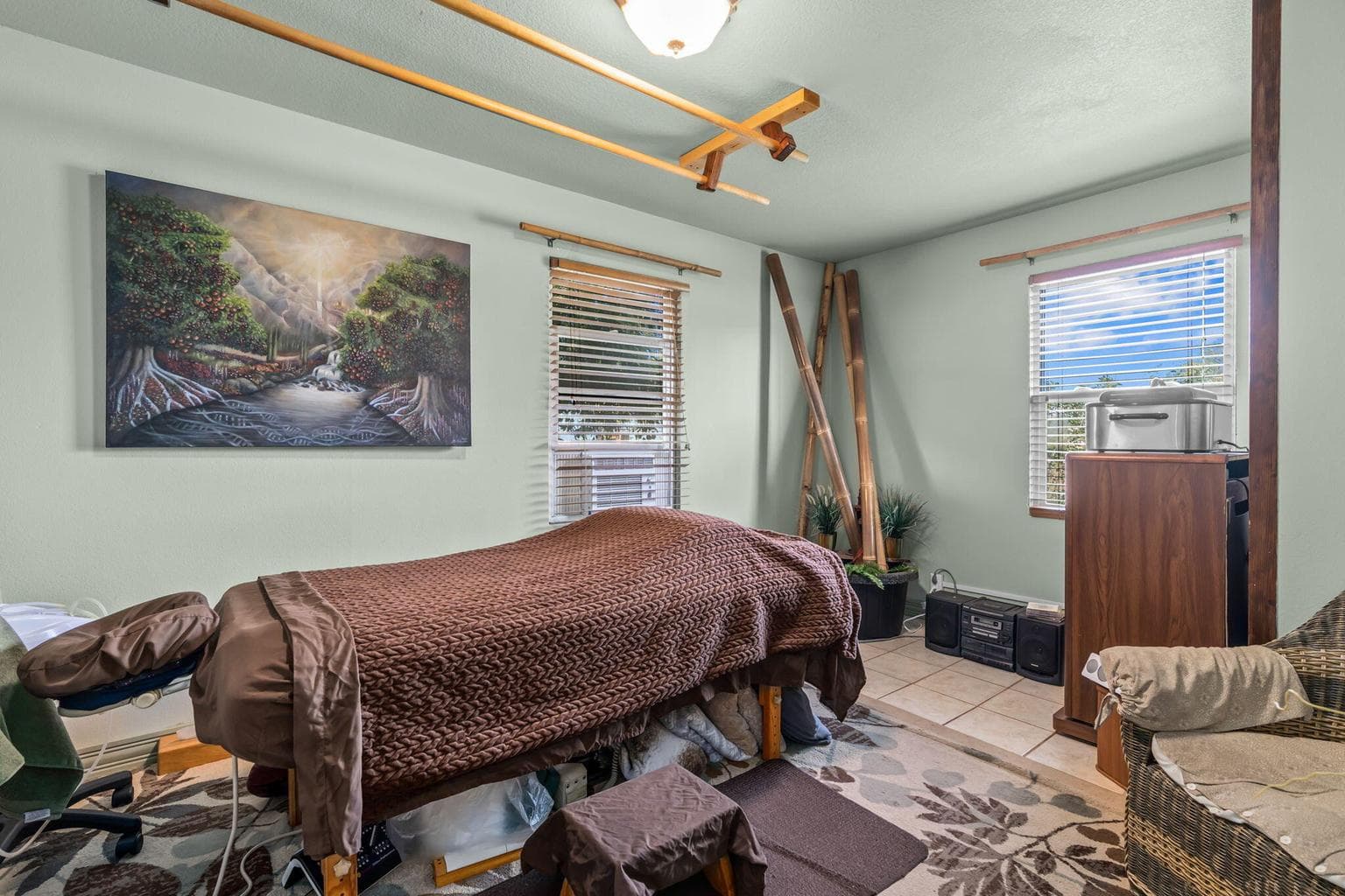 Bedroom 2 currently set up as a Massage Room. Overlooks front and side yards.