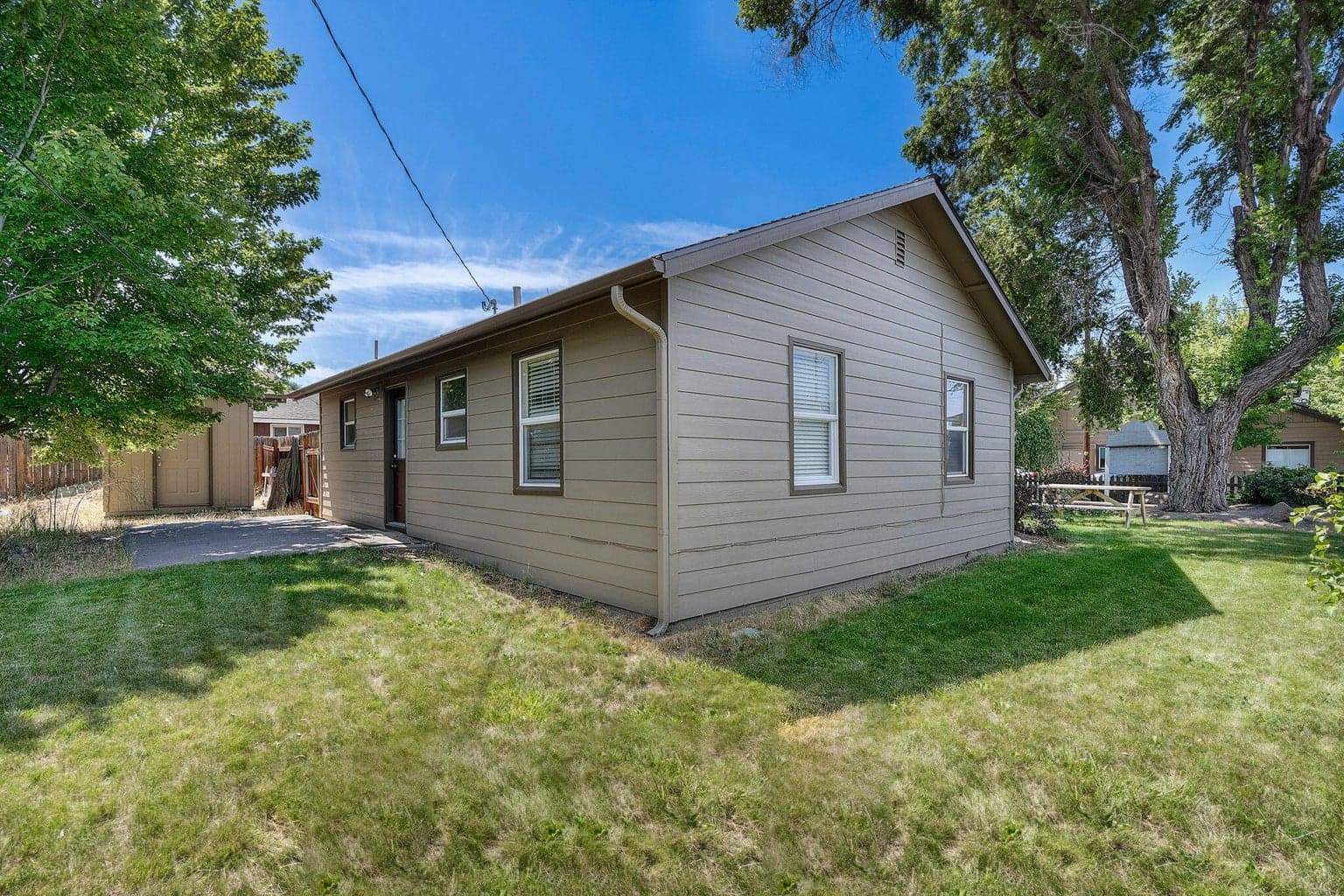 Sprinklers and timer for both front and back yards.