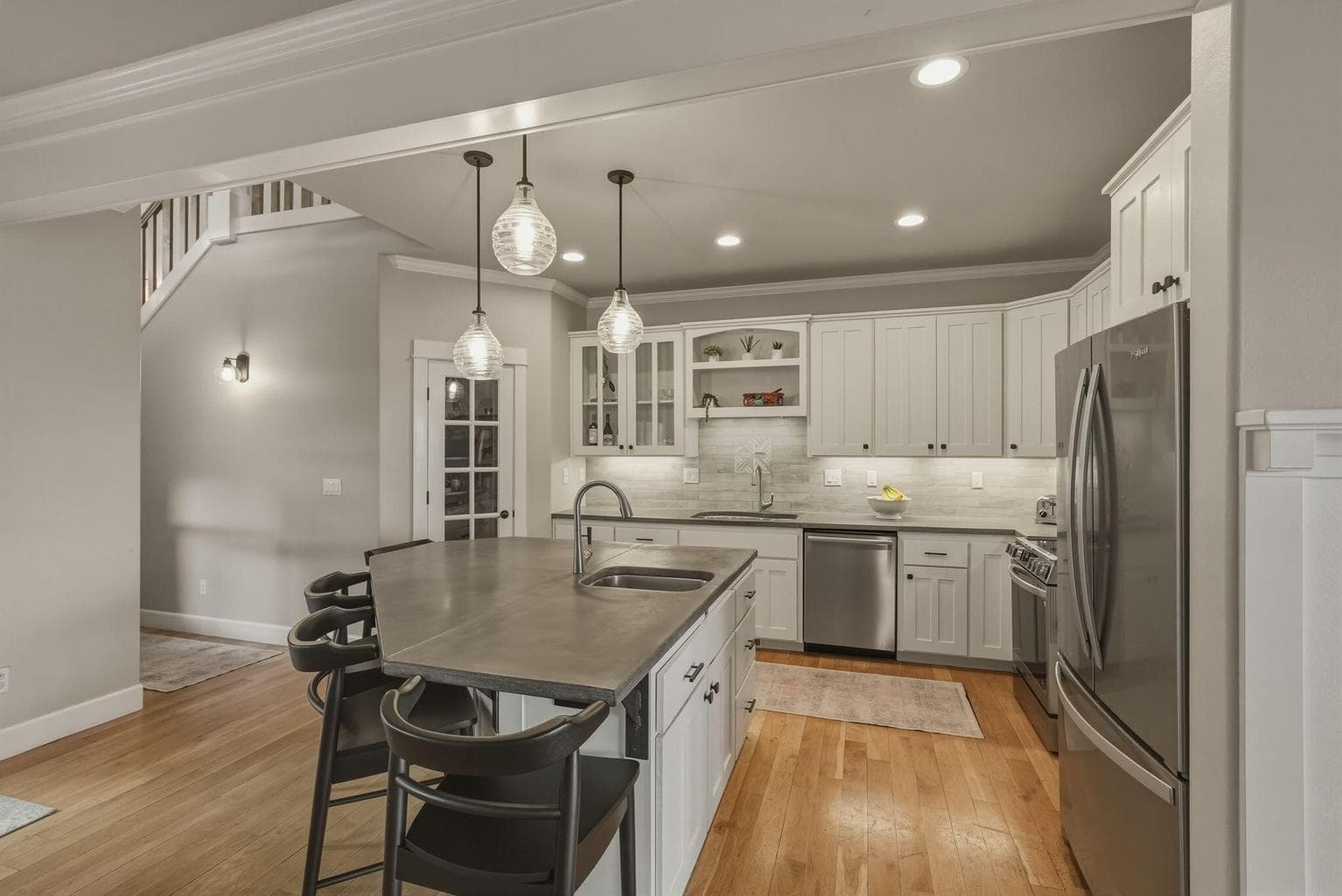 Newly painted kitchen cabinets brighten the space