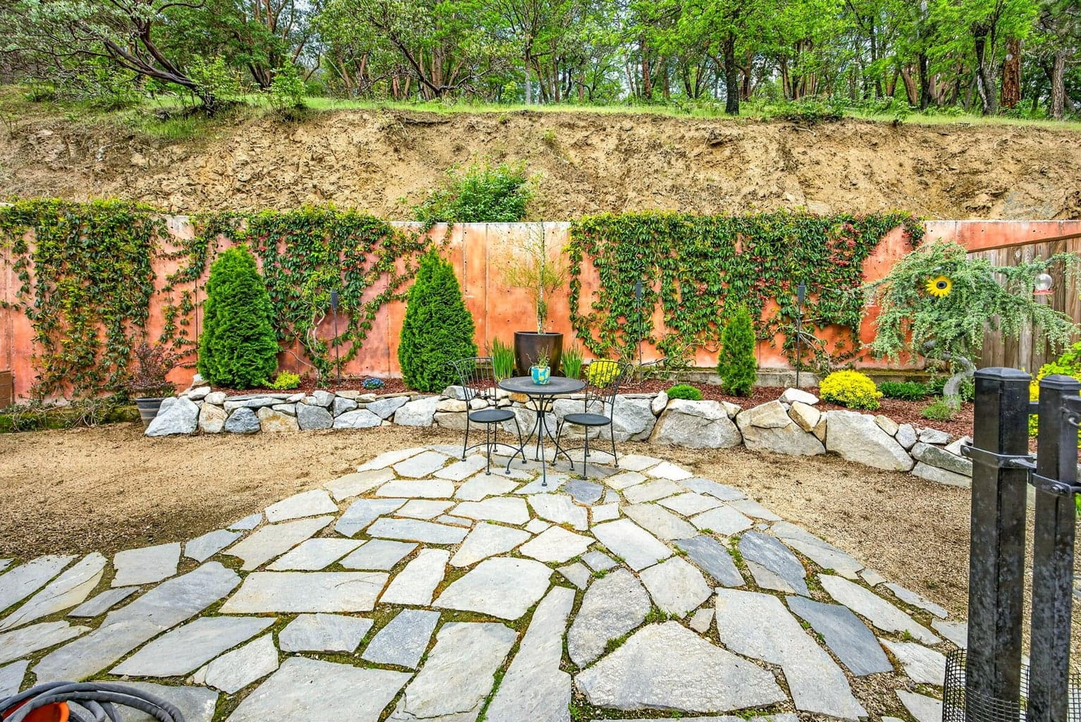 The property is low maintenance but perfect for entertaining w/ multiple separate outdoor spaces