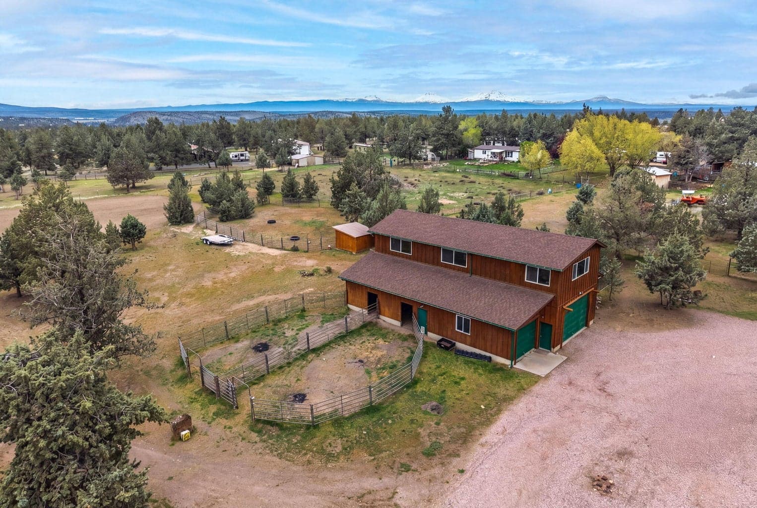 Wide shot of the 5-acre horse-friendly property in the high desert landscape.