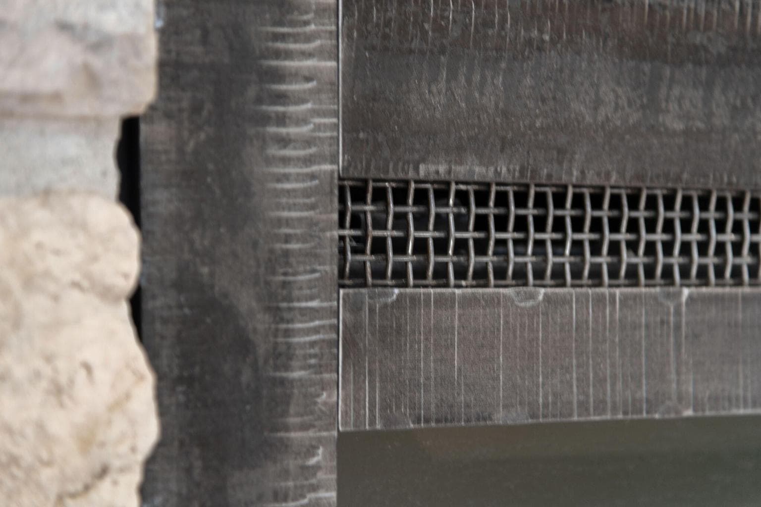 Custom ironwork fireplace grate