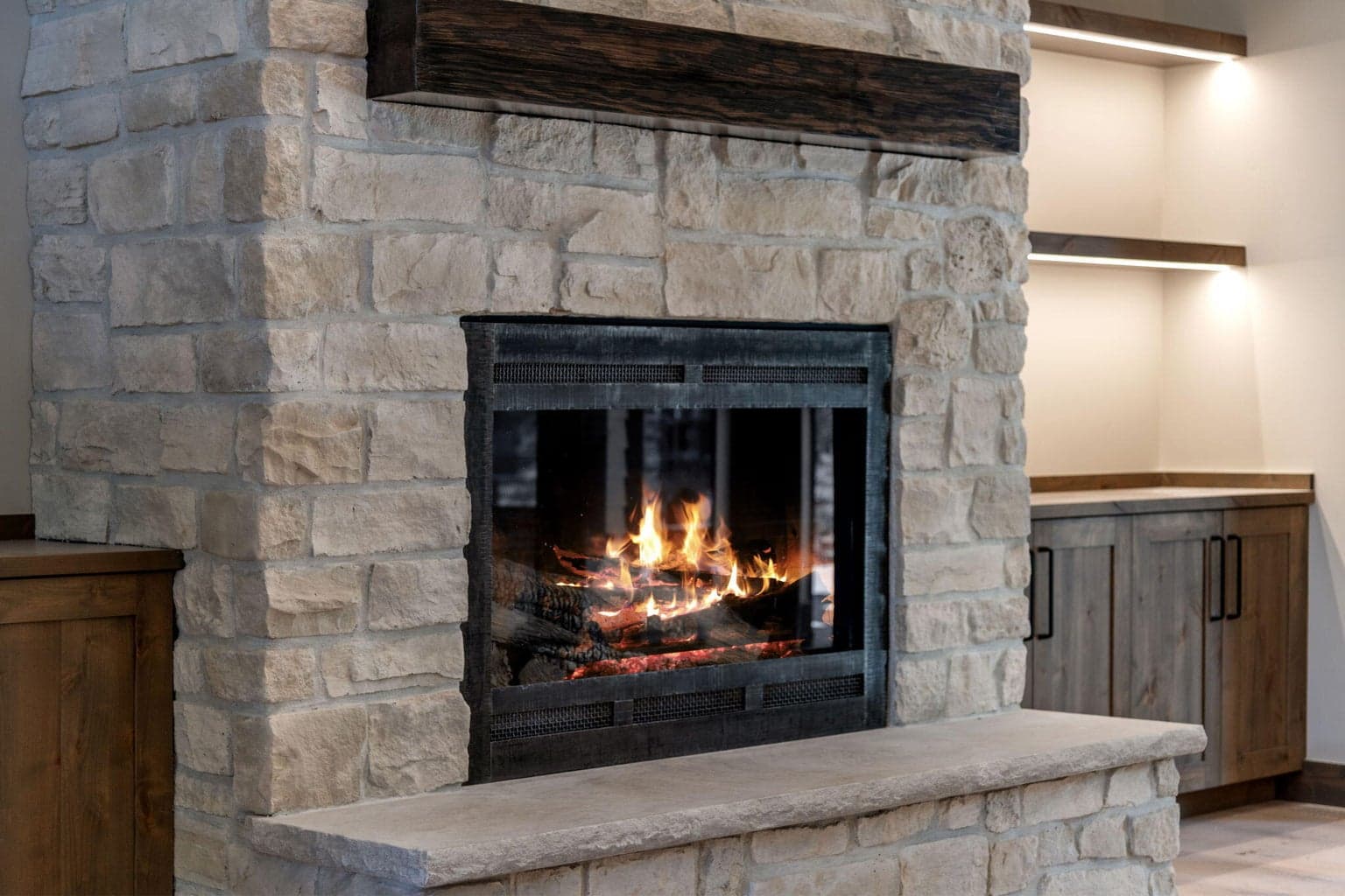 Limestone hearth and custom mantle
