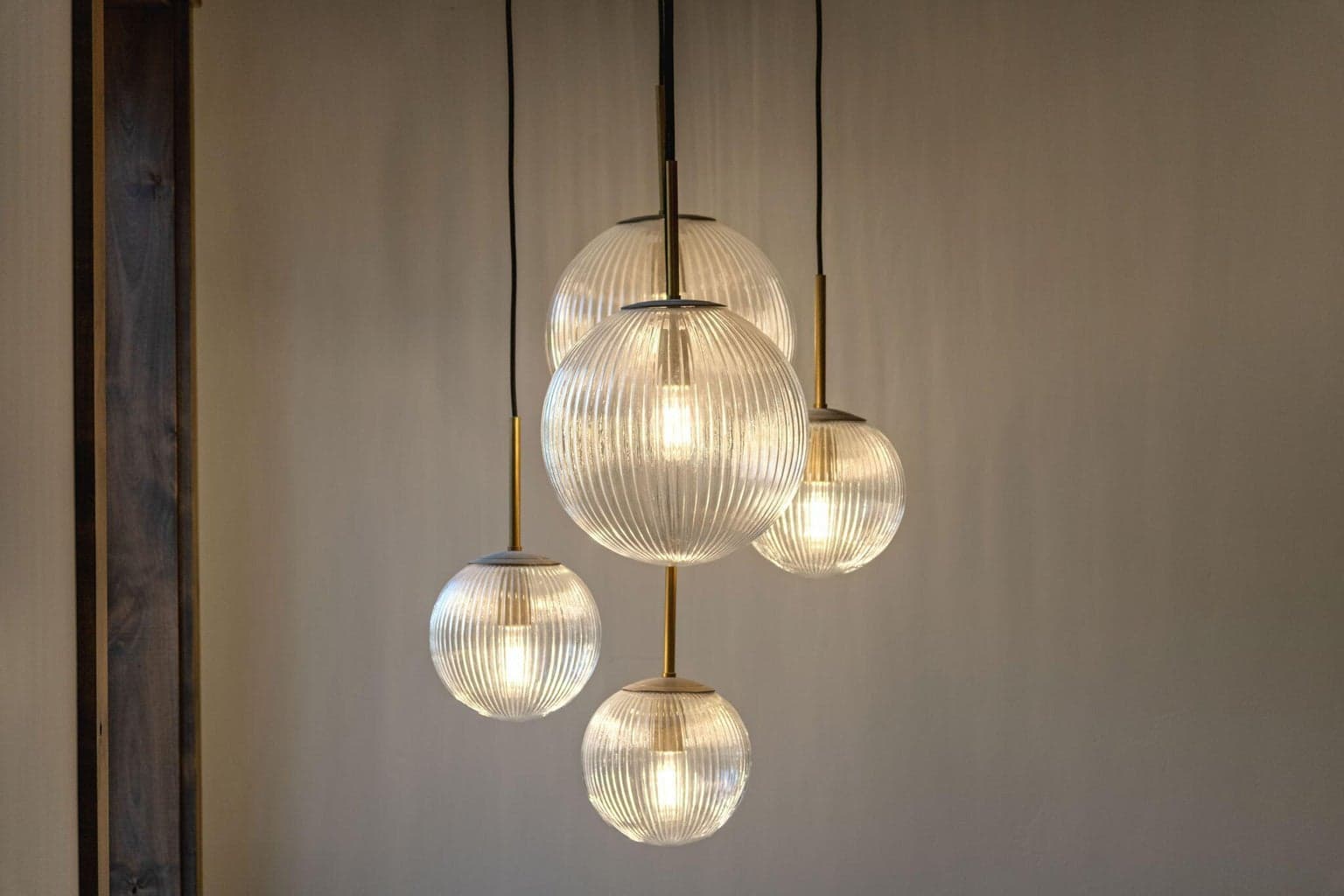 Stunning light fixtures from Restoration Hardware, West Elm and Pottery Barn through the home including the staircase