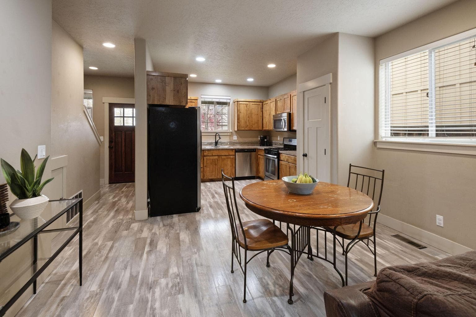 Open floor plan on the main level from the kitchen to the dining room to the living room