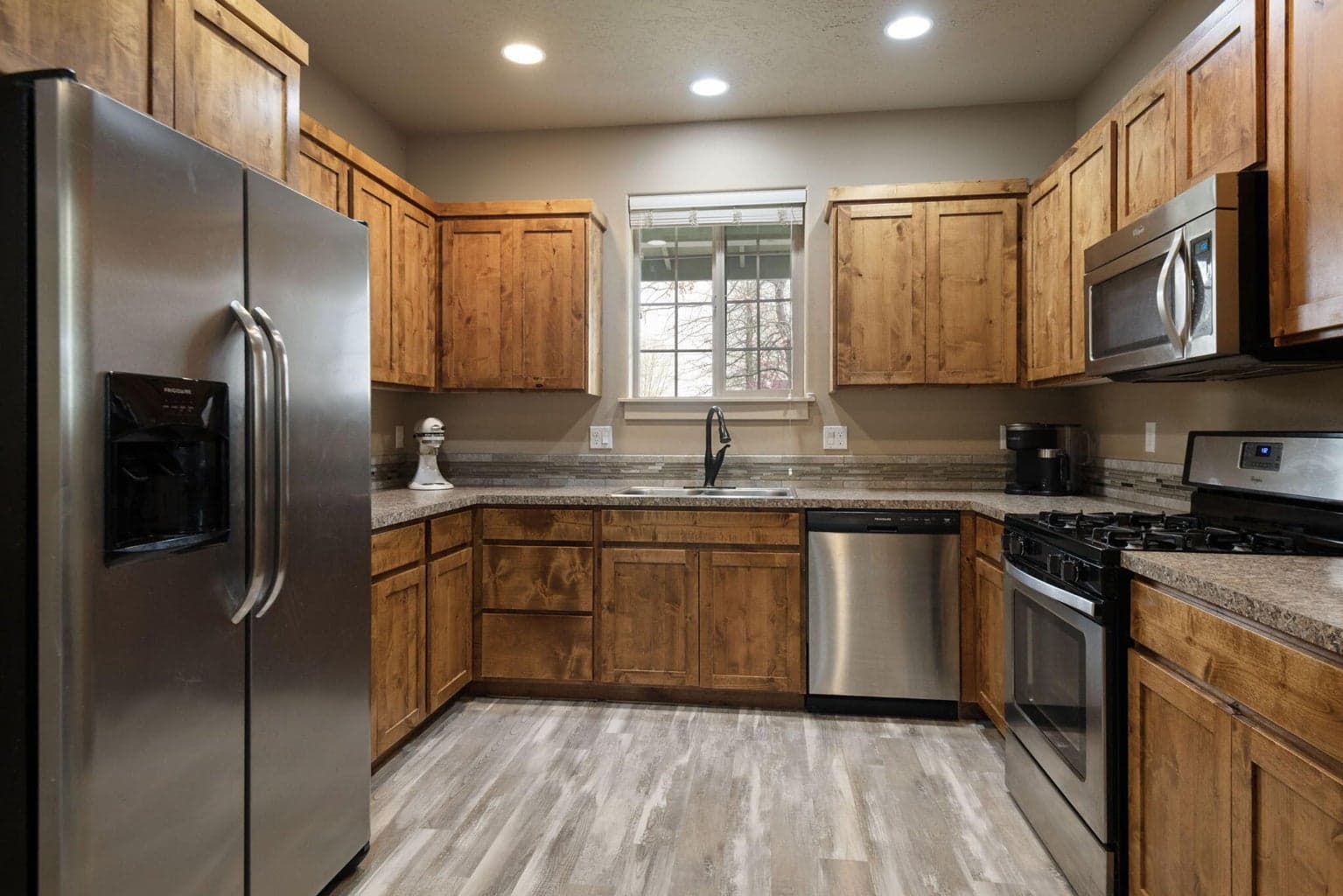 All stainless steel kitchen appliances are included- gas stove, by the way...and the dishwasher is less than a year old