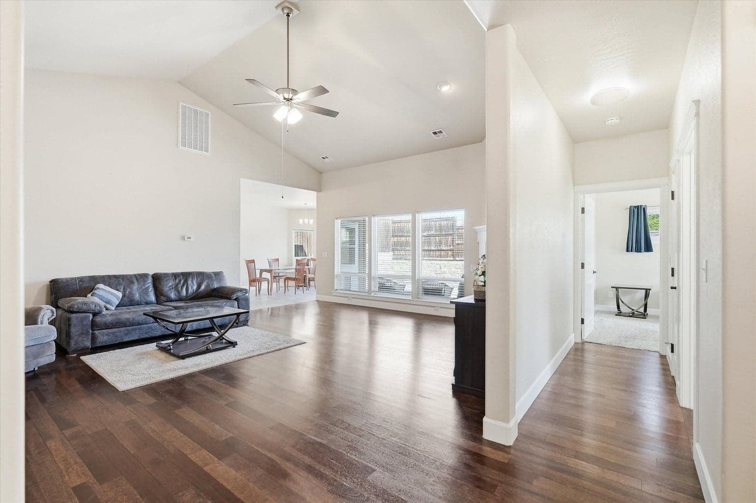 Living room and view to second bedroom