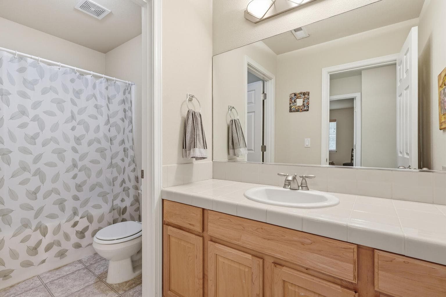 Upstairs full bathroom with separate toilet/shower room
