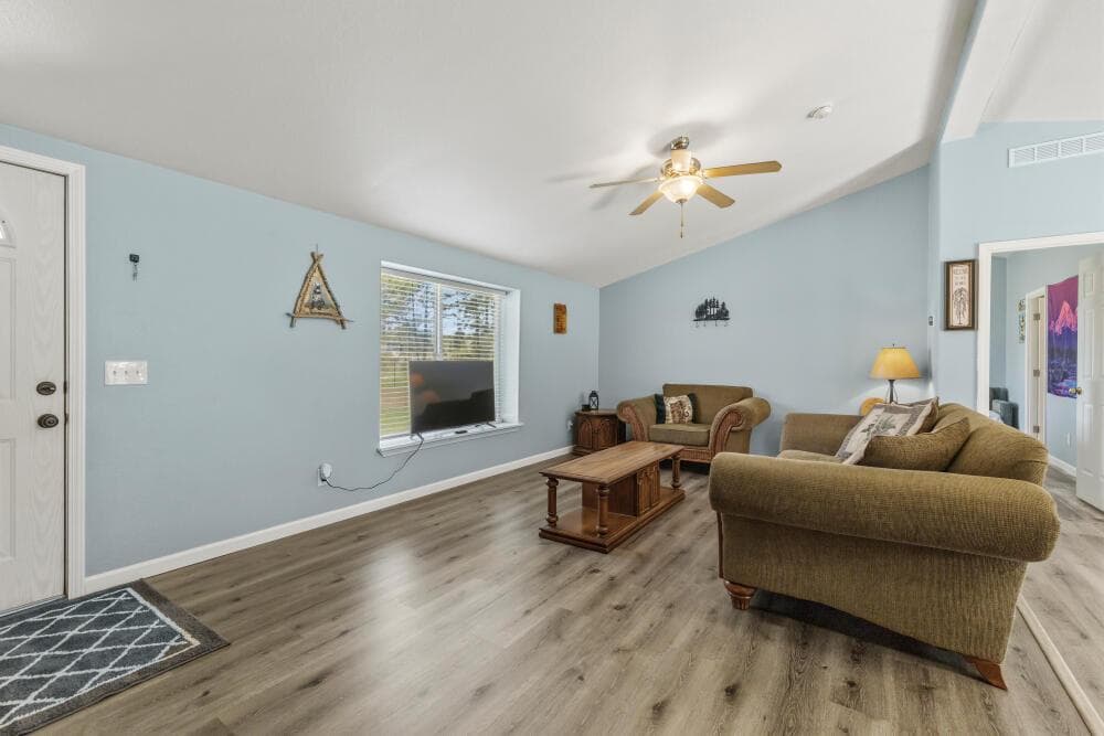 living room with new laminate flooring