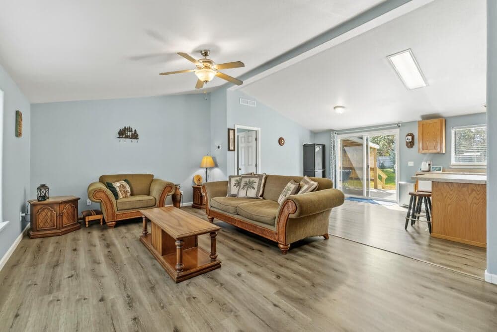 living room open to dining room and kitchen