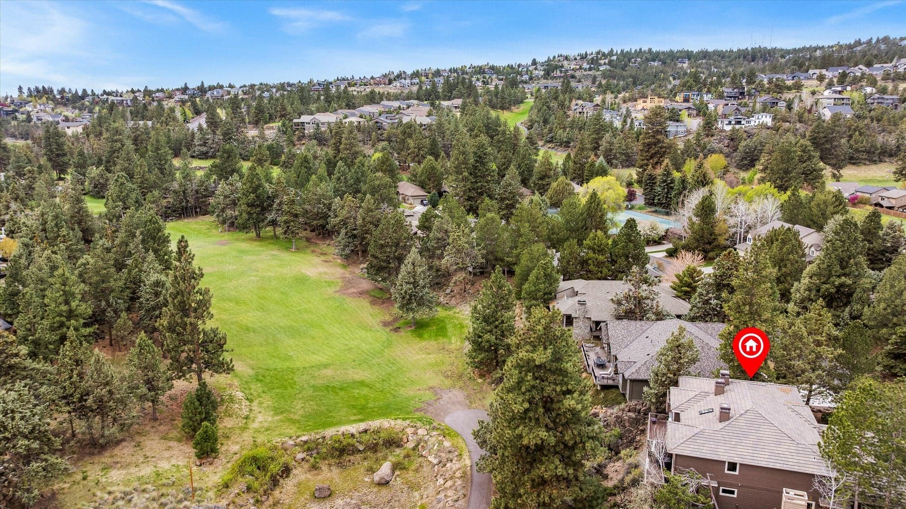Elevated View of the golf course and water features from the first floor deck