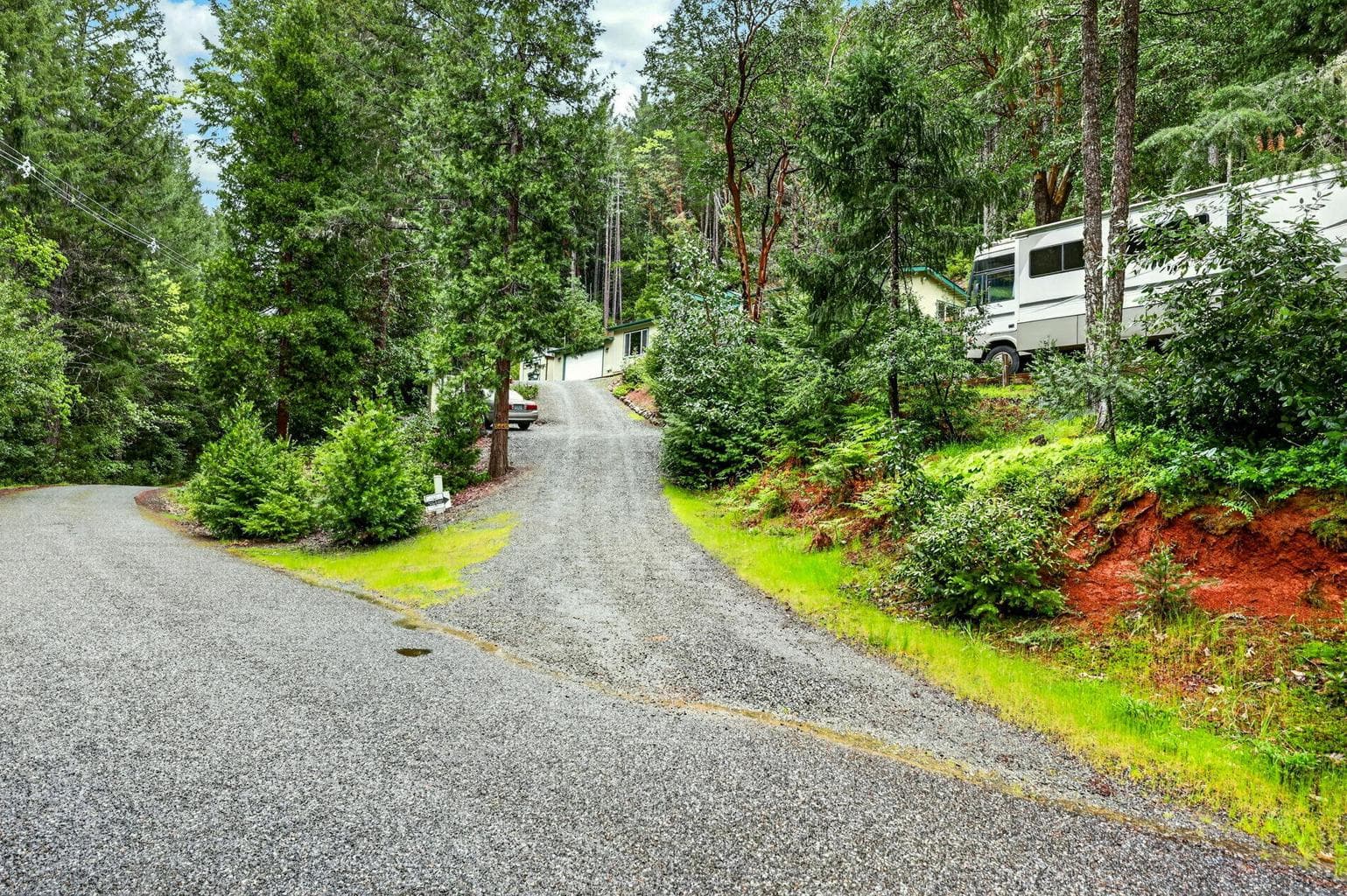 Paved Roadway with gravel Driveway