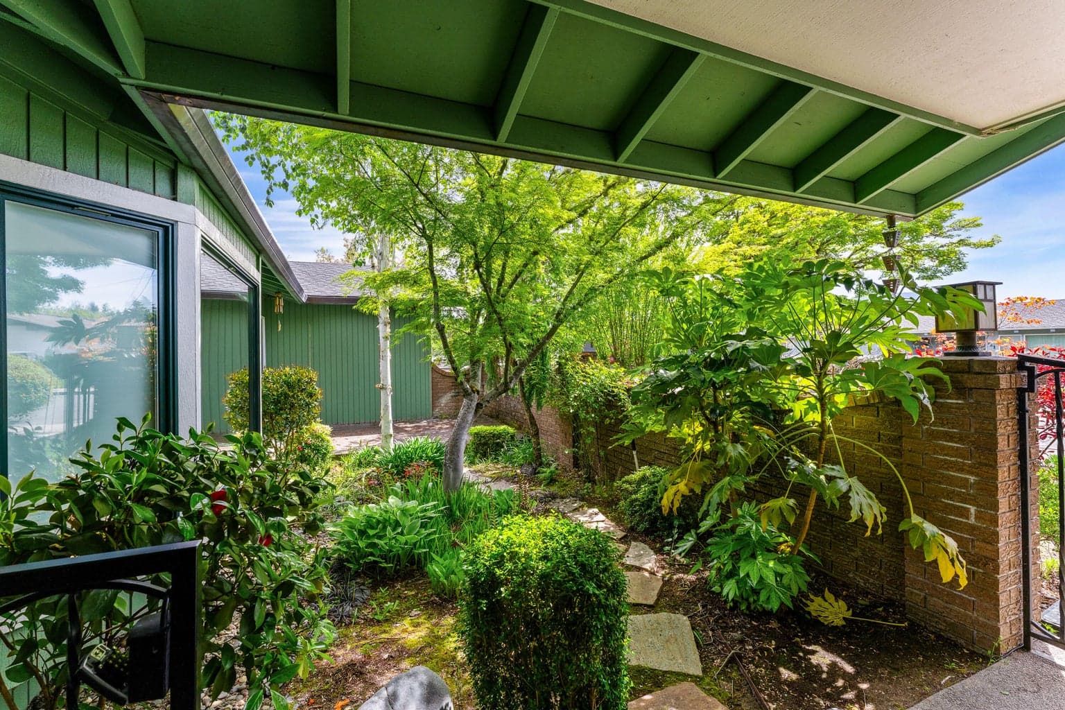 Beautiful front courtyard is private