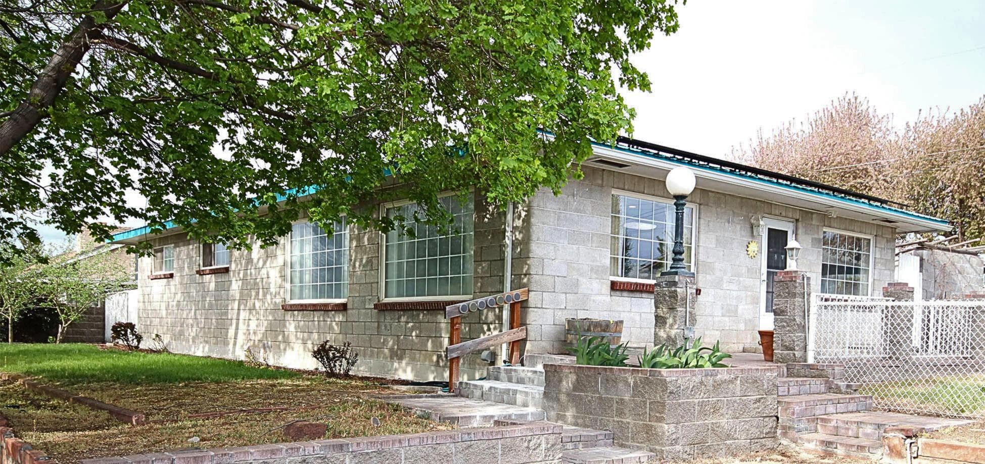The two parking spaces in front of the house give you east access to the home's entrance