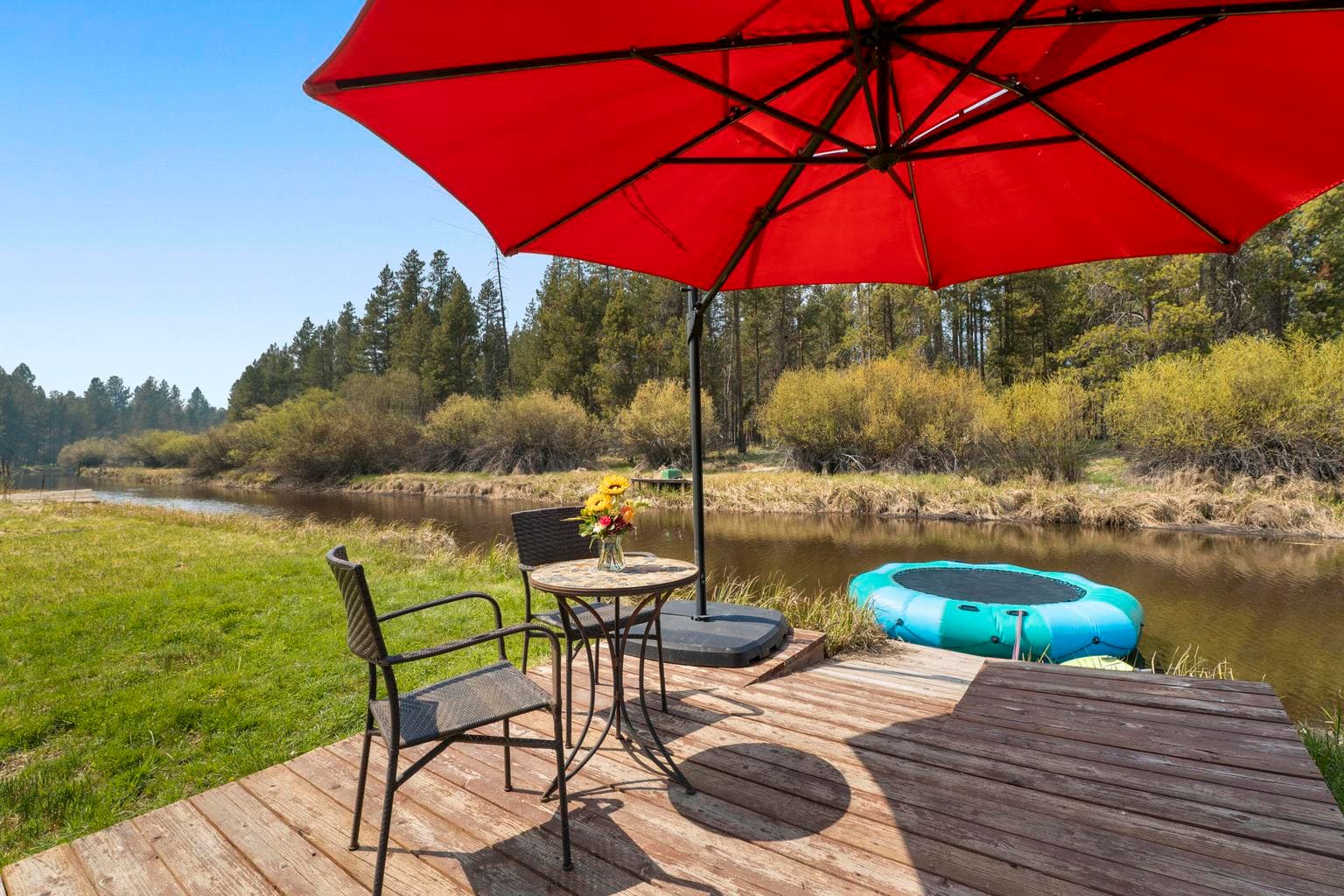 Dock with waterfront seating.