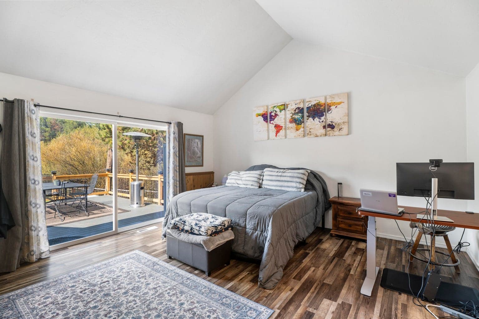 rimary bedroom slider opens directly to a private deck retreat