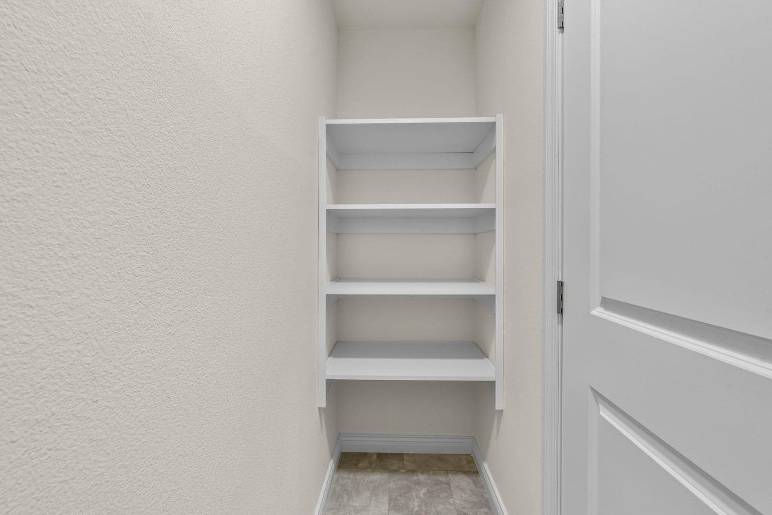 Linen shelves in primary water closet