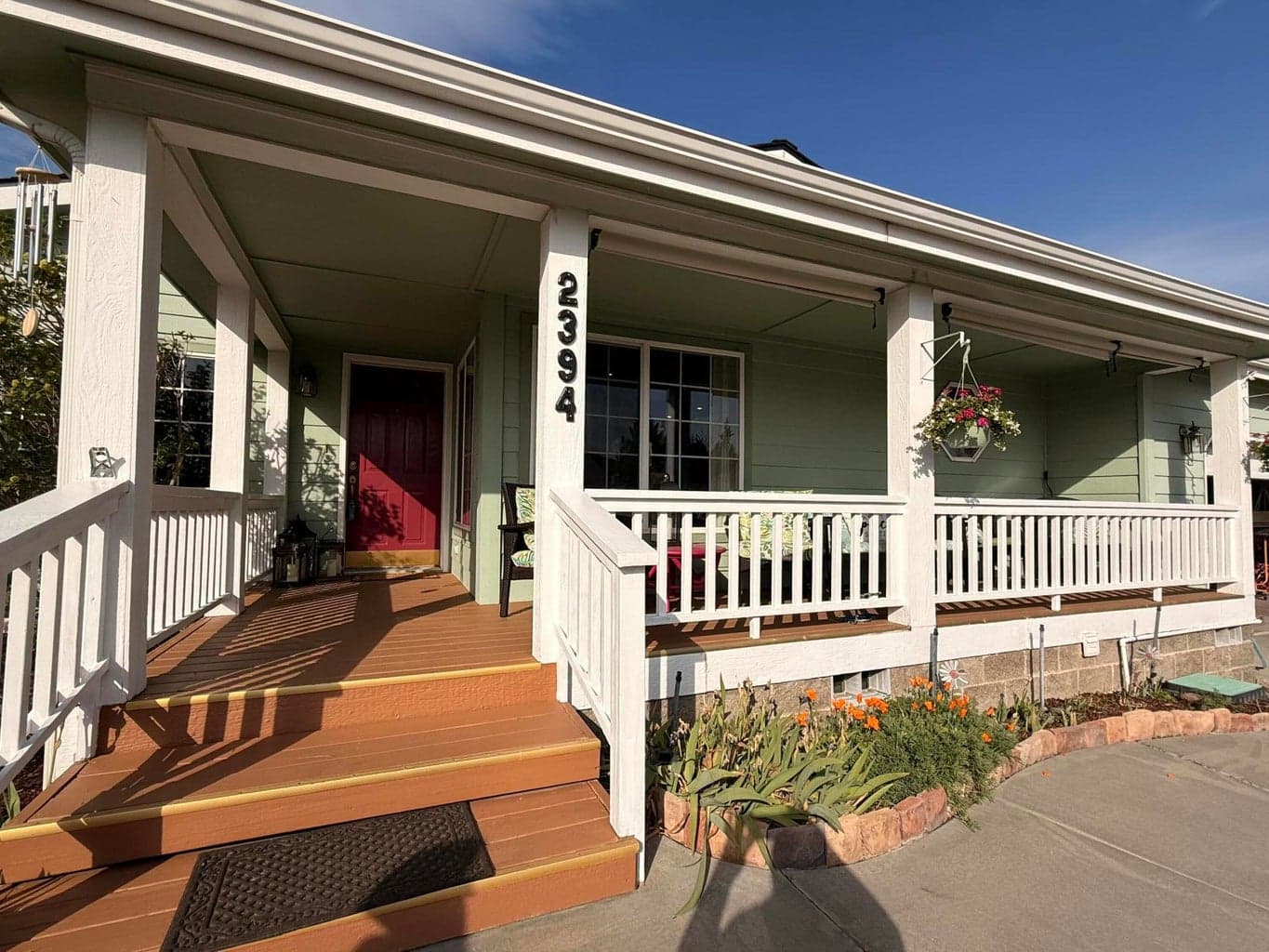 Covered front deck entry and sitting area