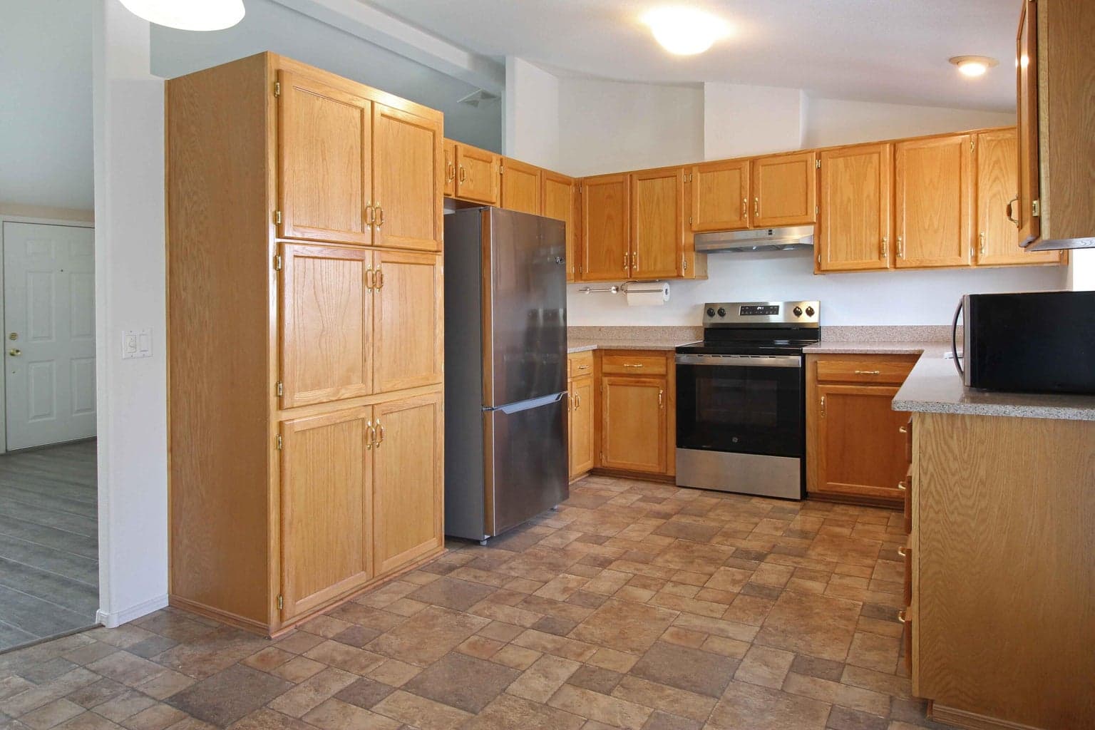 Kitchen includes all appliances, lots of cabinets.