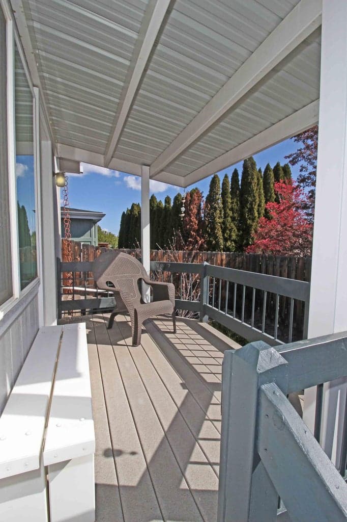 Photo 1 of The private covered porch just off the Hobby/Office room.
